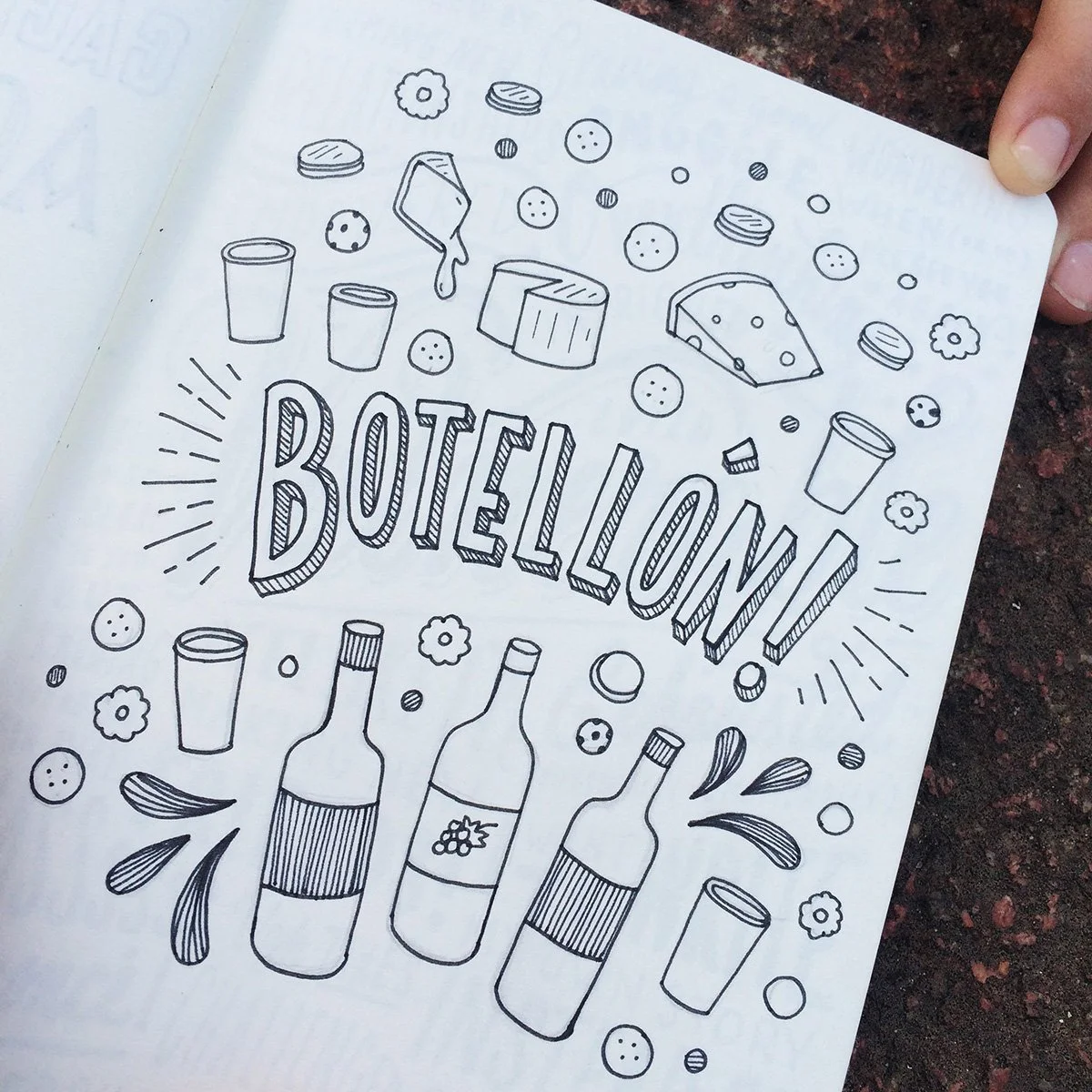 Sketchbook page reading "Botellon!" surrounded by illustrations of cheese, crackers, and wine.