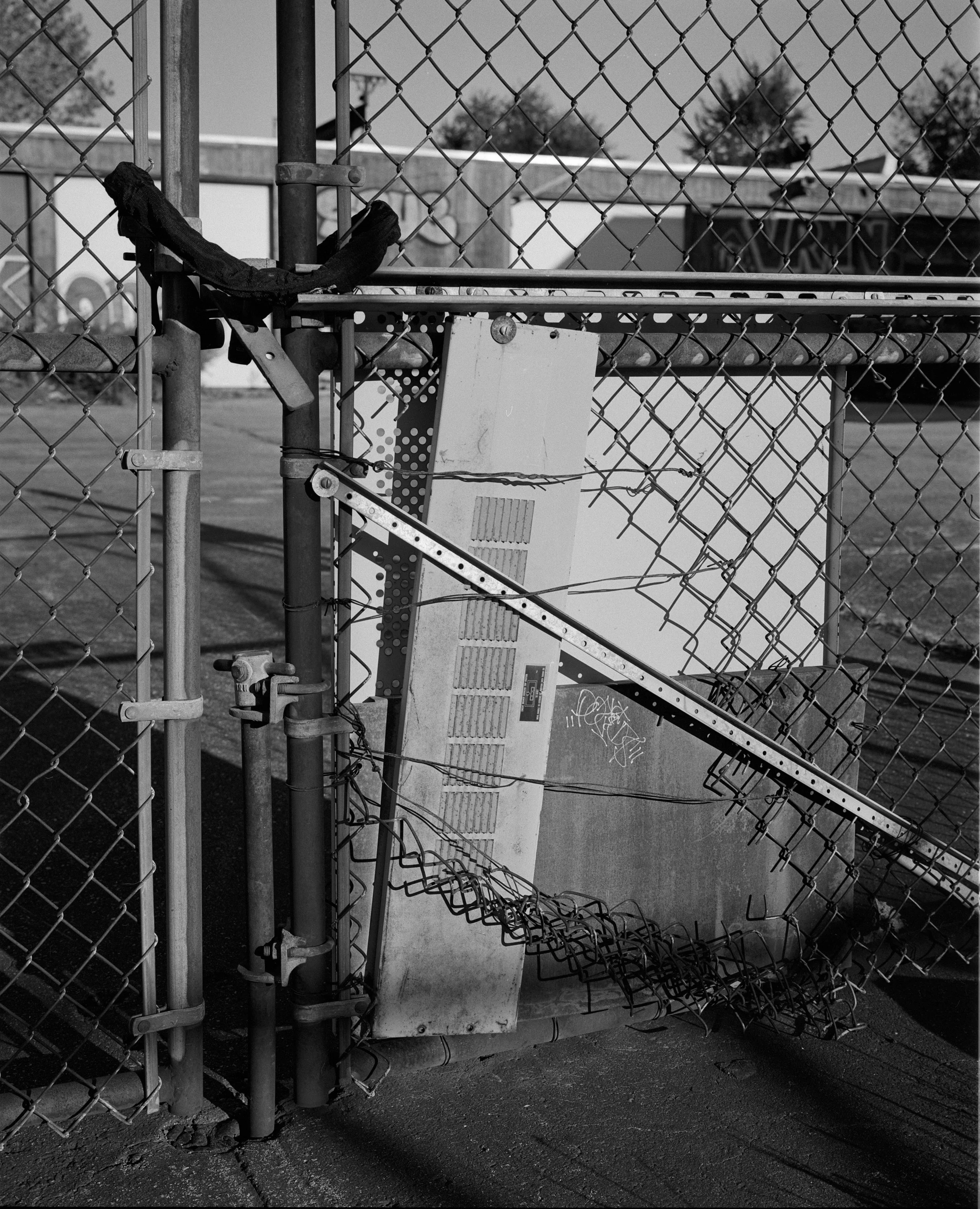 Metal Fence Gate Locked.jpeg