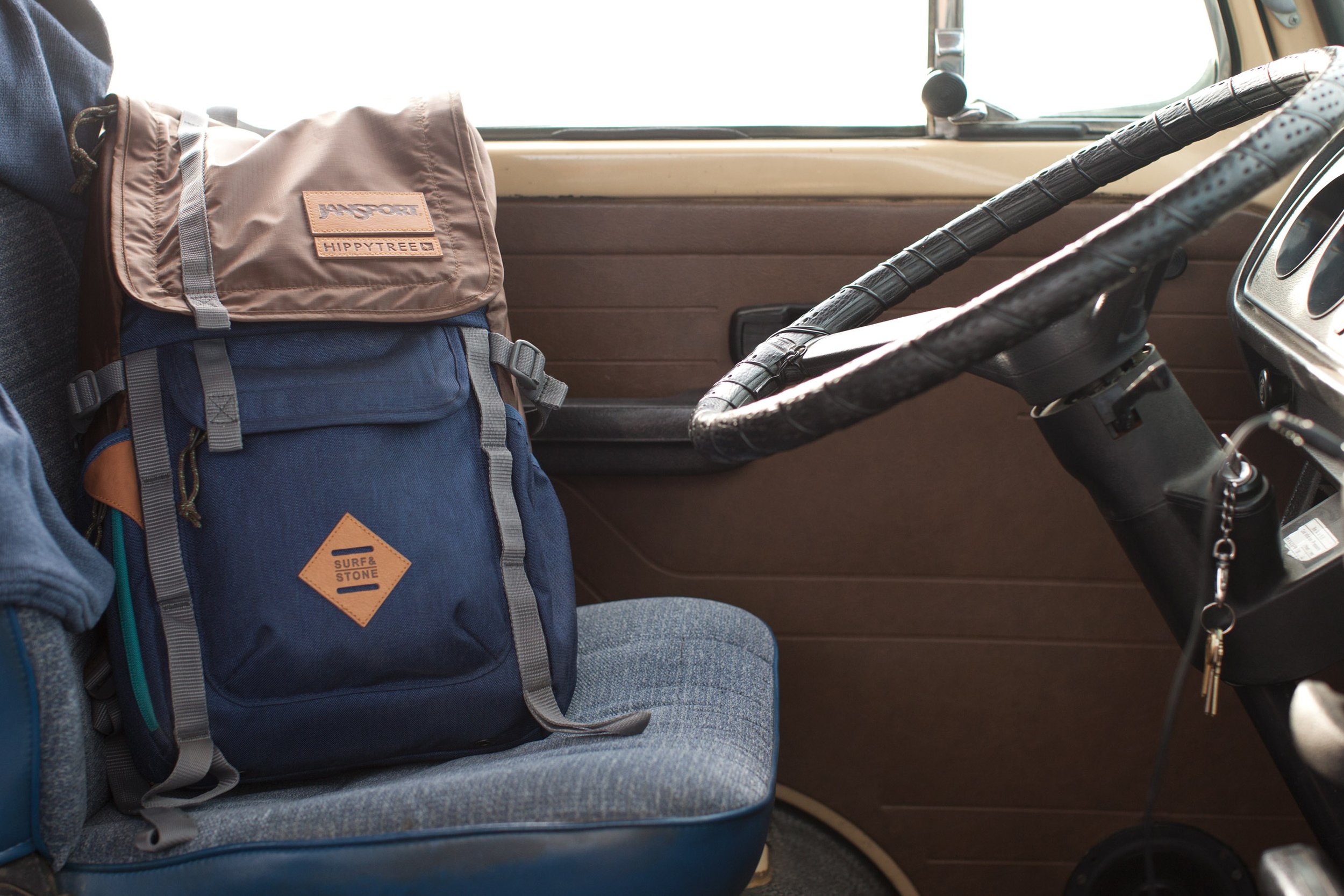 jansport bag on drivers side car seat.jpg