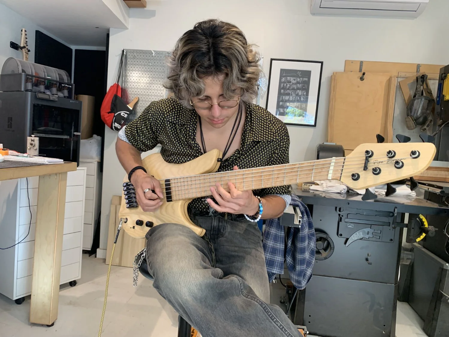 Somebody get a fire extinguisher.  Hugo picked up a guitar.