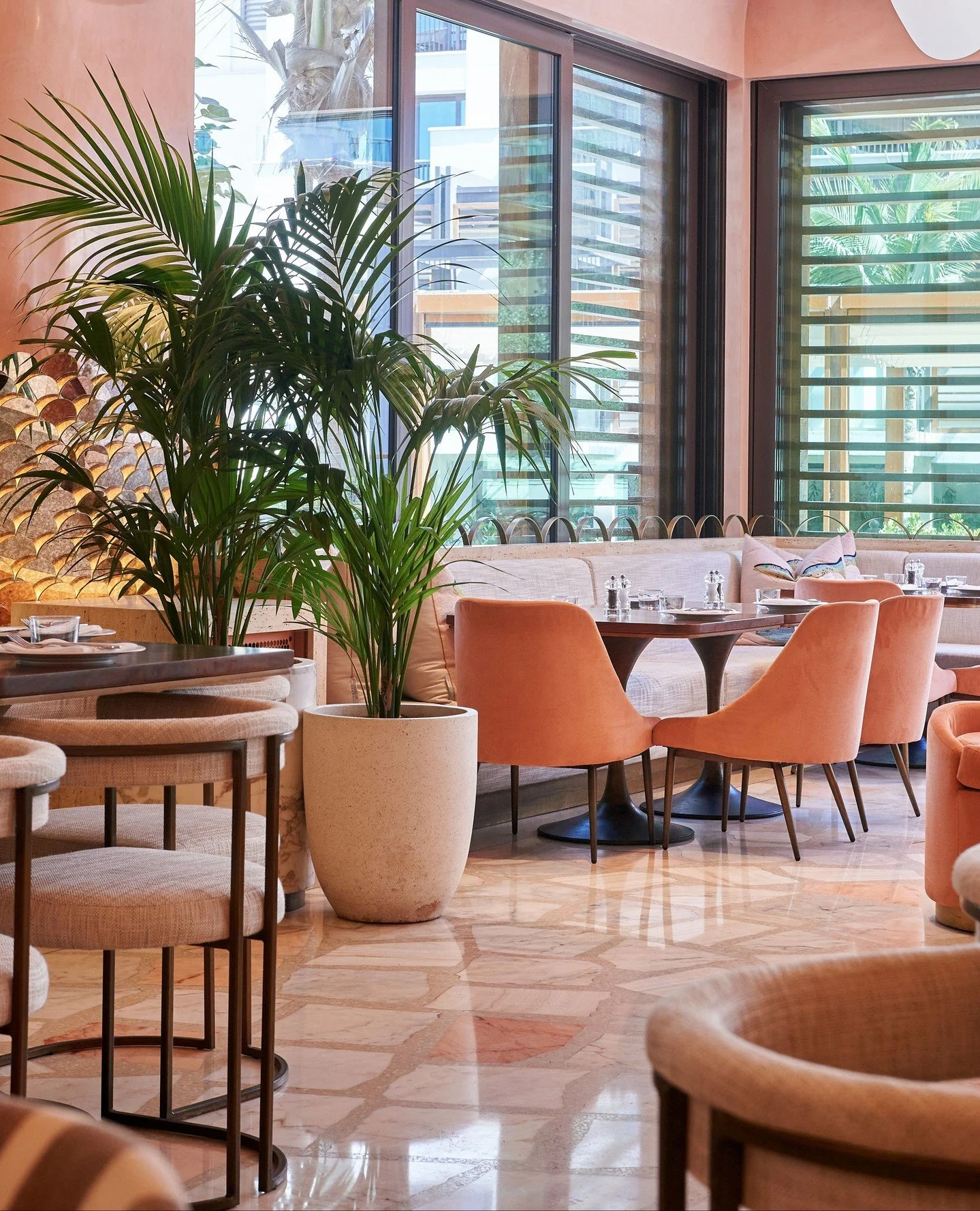 Flamingo Room is inspired by the glamour of Africa, with a playful nod to Miami Art Deco. Designed by Neydine Bak, the space blends sculptural silhouettes, peach-toned walls, and soft lighting to create an atmosphere that&rsquo;s both striking and in