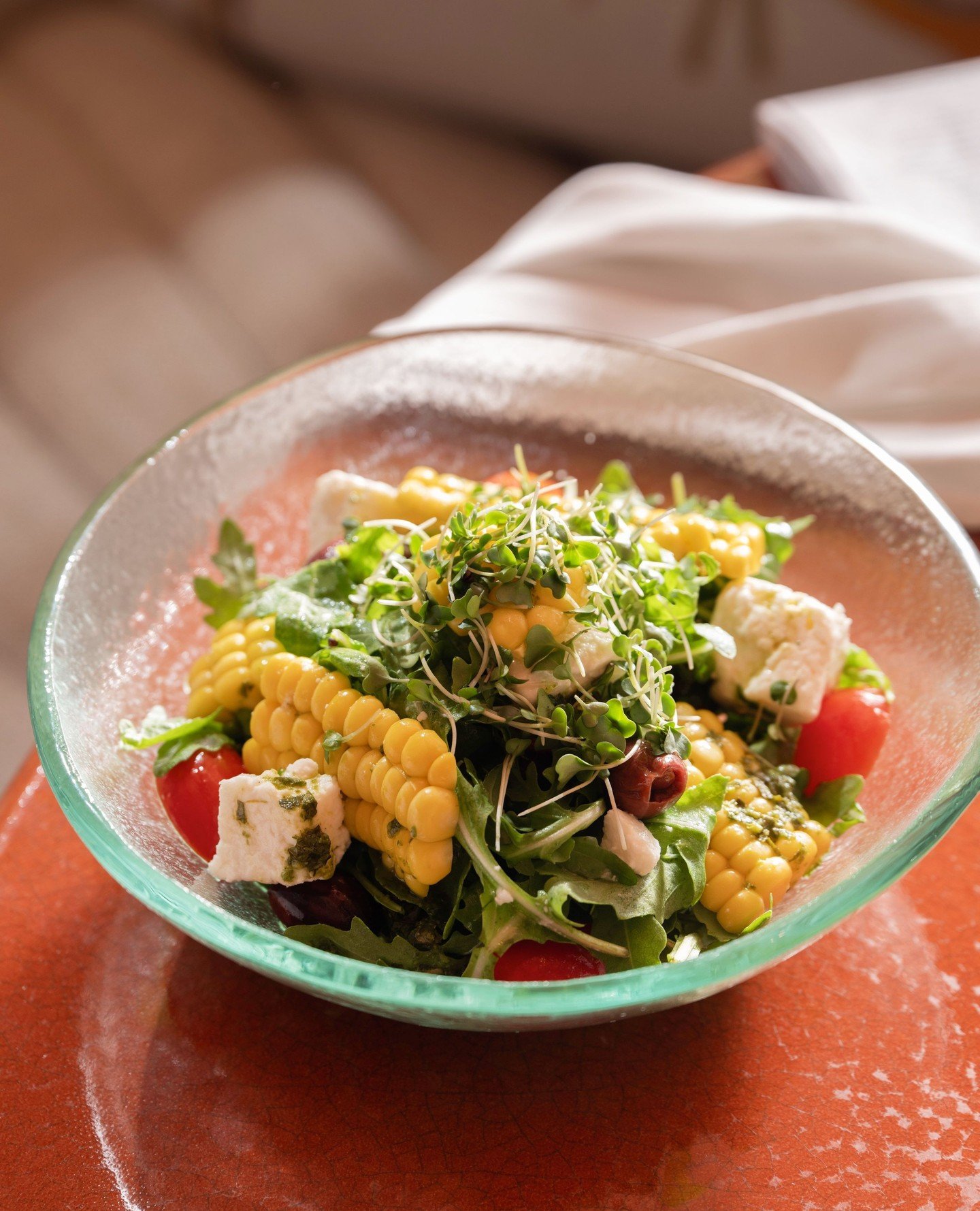 Corn, feta and cherry tomatoes may feel familiar now, but it is a pairing we&rsquo;ve been serving in the UAE since the early days. Our Texas Salad keeps that original spirit, lifted with olives, herbs and a light lemon pesto dressing.⁠
⁠
#flamingoro