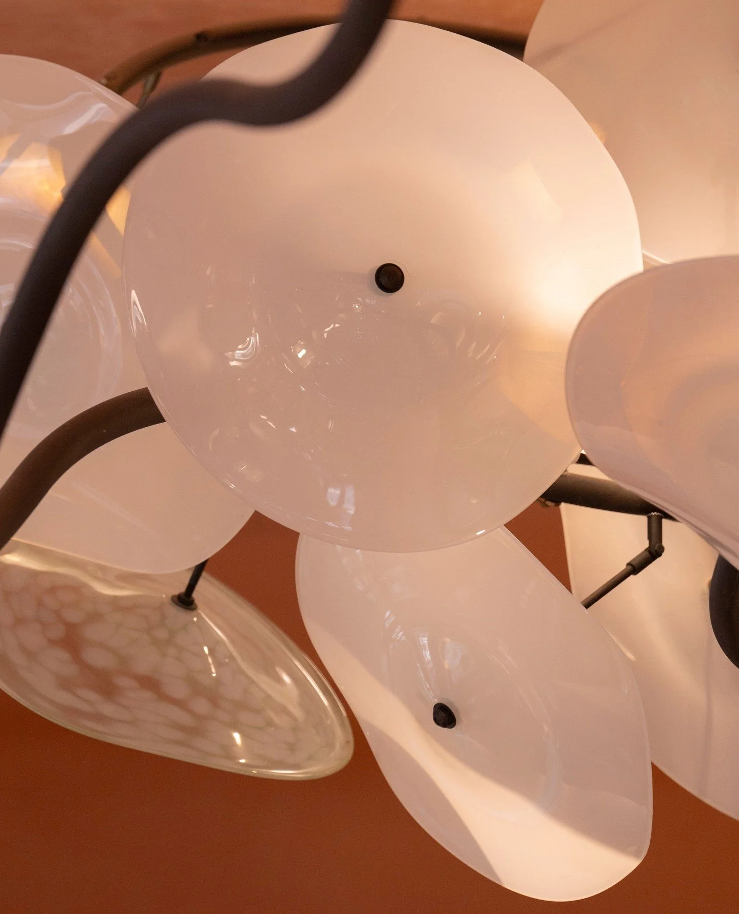 At the heart of Flamingo Room hangs a piece that quietly defines the space. Our hand-blown baobab installation, created by artist Mike Hyam, is a tribute to Africa&rsquo;s most iconic tree. Each glass form is shaped individually, echoing the silhouet