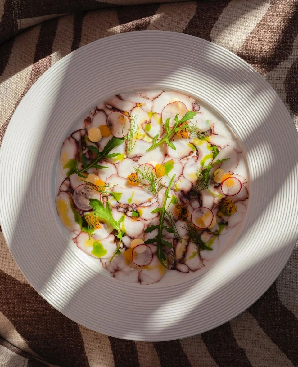 Octopus Carpaccio, finished with mango emulsion, Japanese mayonnaise, rocket, candied orange, radish and fennel, brought together with a citrus vinaigrette. Light, fresh and layered in flavour.⁠
⁠
Enjoy it in store, or order through Deliveroo.⁠
⁠
⁠
#