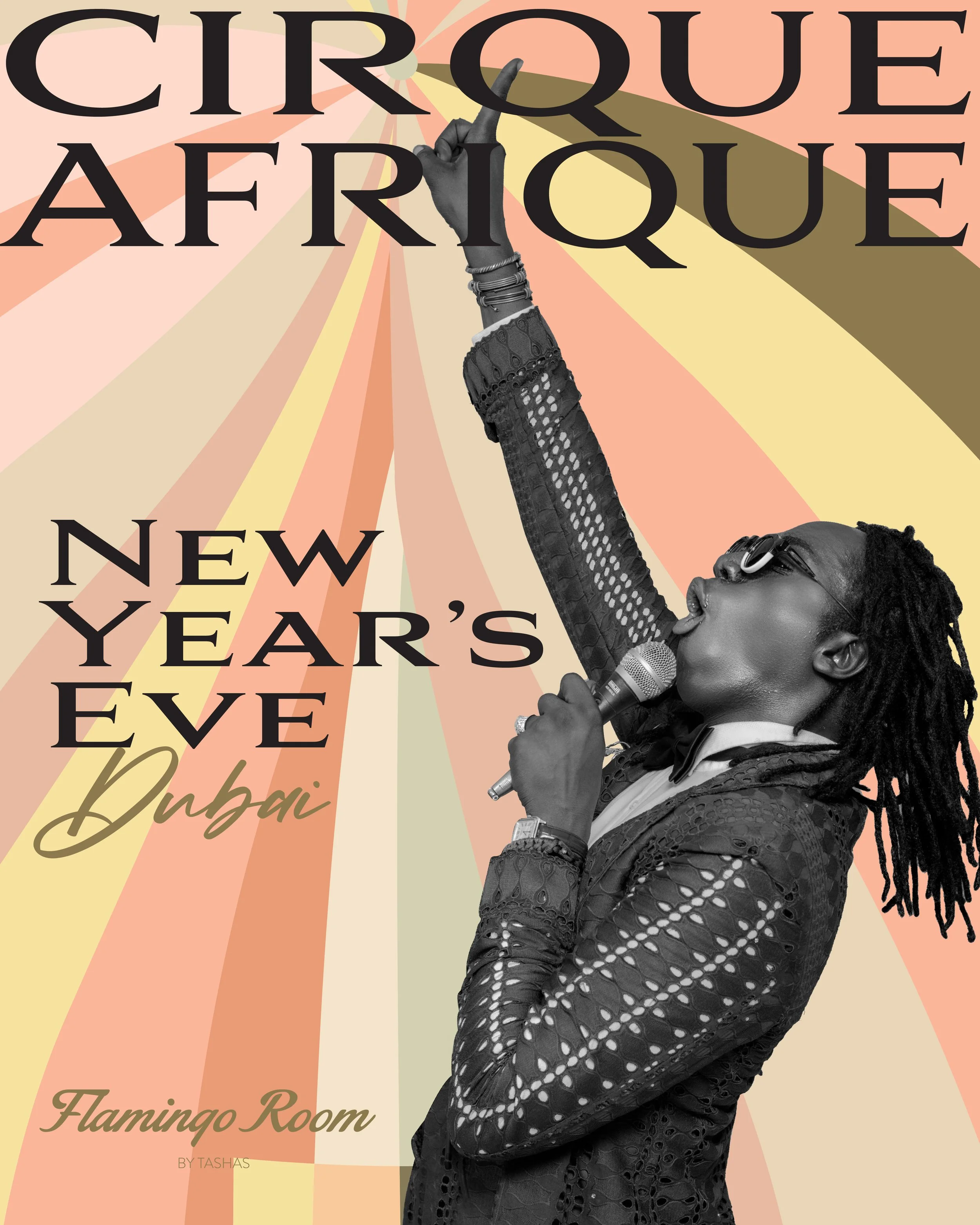 A woman with dreadlocks wearing sunglasses and a lace black dress is singing into a microphone and pointing upward with her finger. The background features radial pastel-colored lines. The text on the image promotes a New Year's Eve event in Dubai at the Flamingo Room with the words 'Cirque Afrique' and 'New Year's Eve Dubai.'