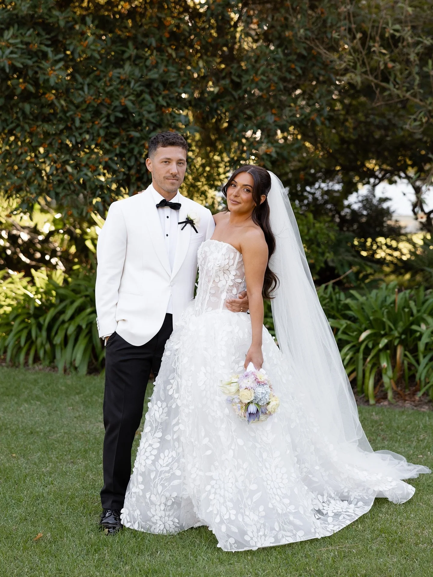 Jess &amp; Justin&rsquo;s classic romance showcased in different lights. 🤍

@therefectory_werribeepark 
@partyplants.flowers 
@kwhbridal 
@hairbyjc 
@mikelarkan 
@originalcyn_cakedesign 
@eddyelias_menswear 
@littlelovesigns 
@stephpiazzaartistry