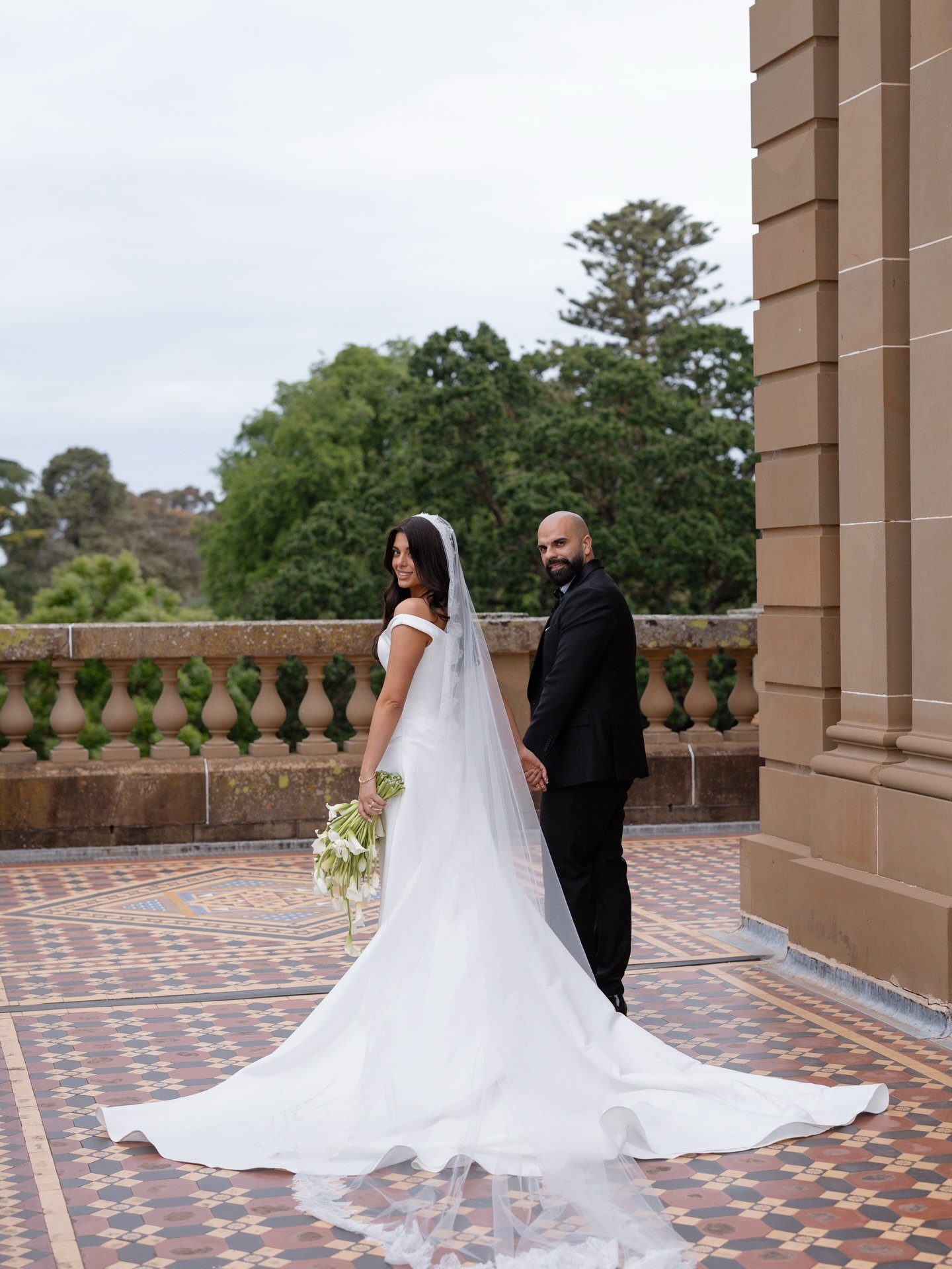 Georgia &amp; George&rsquo;s romantic garden wedding, celebrated amongst the grand and historic architecture beauty that is Werribee Mansion. A week before they held their stunning traditional Greek Orthodox Church ceremony and gathered with their ne