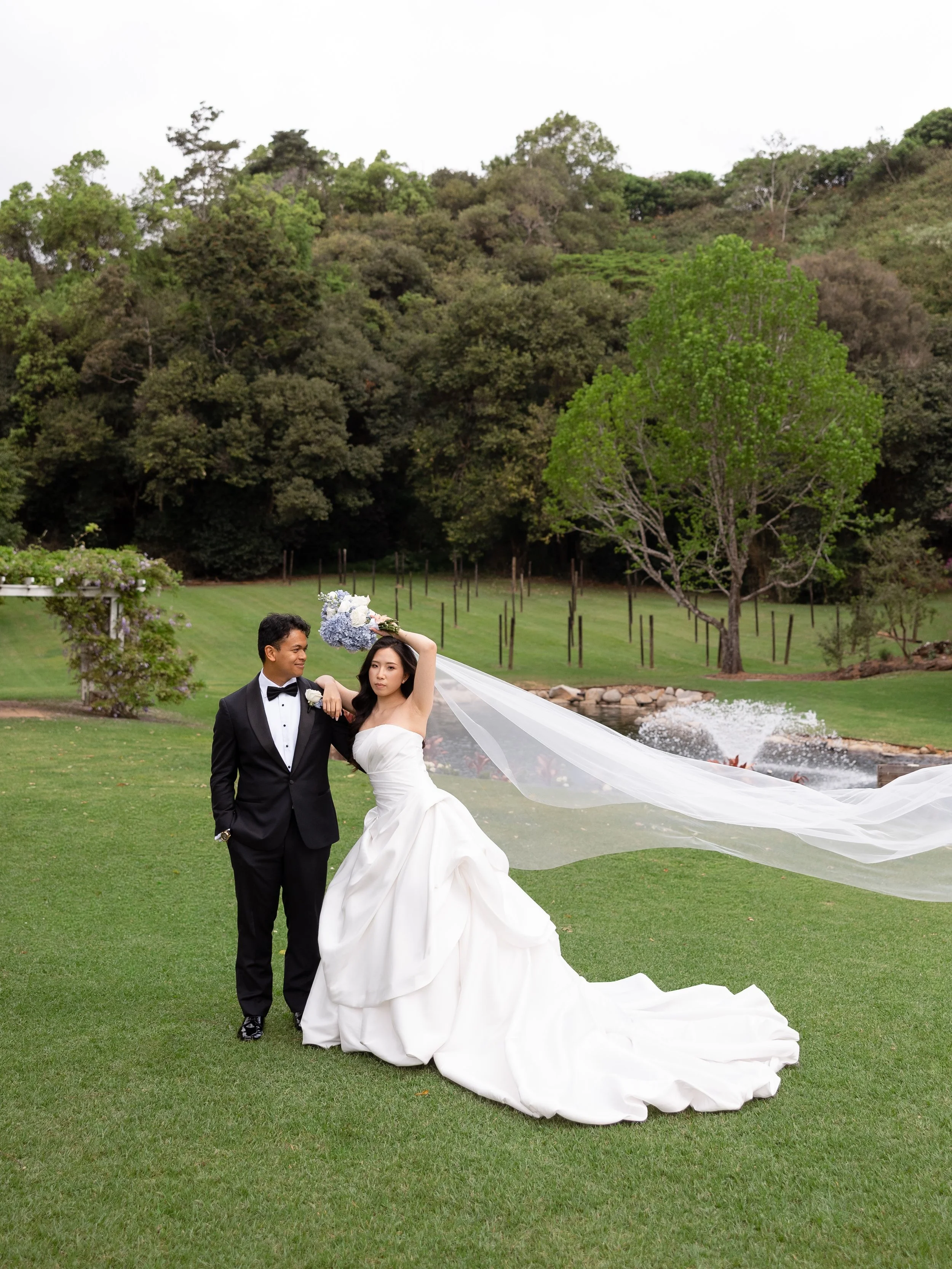 Alicia and Ezra&rsquo;s celebration amongst the lush green hues and scenic coastal views at the private estate of Maleny Manor. Here, their considered guest list comprised of genuine and spirit filled family and friends that gathered to truly celebra