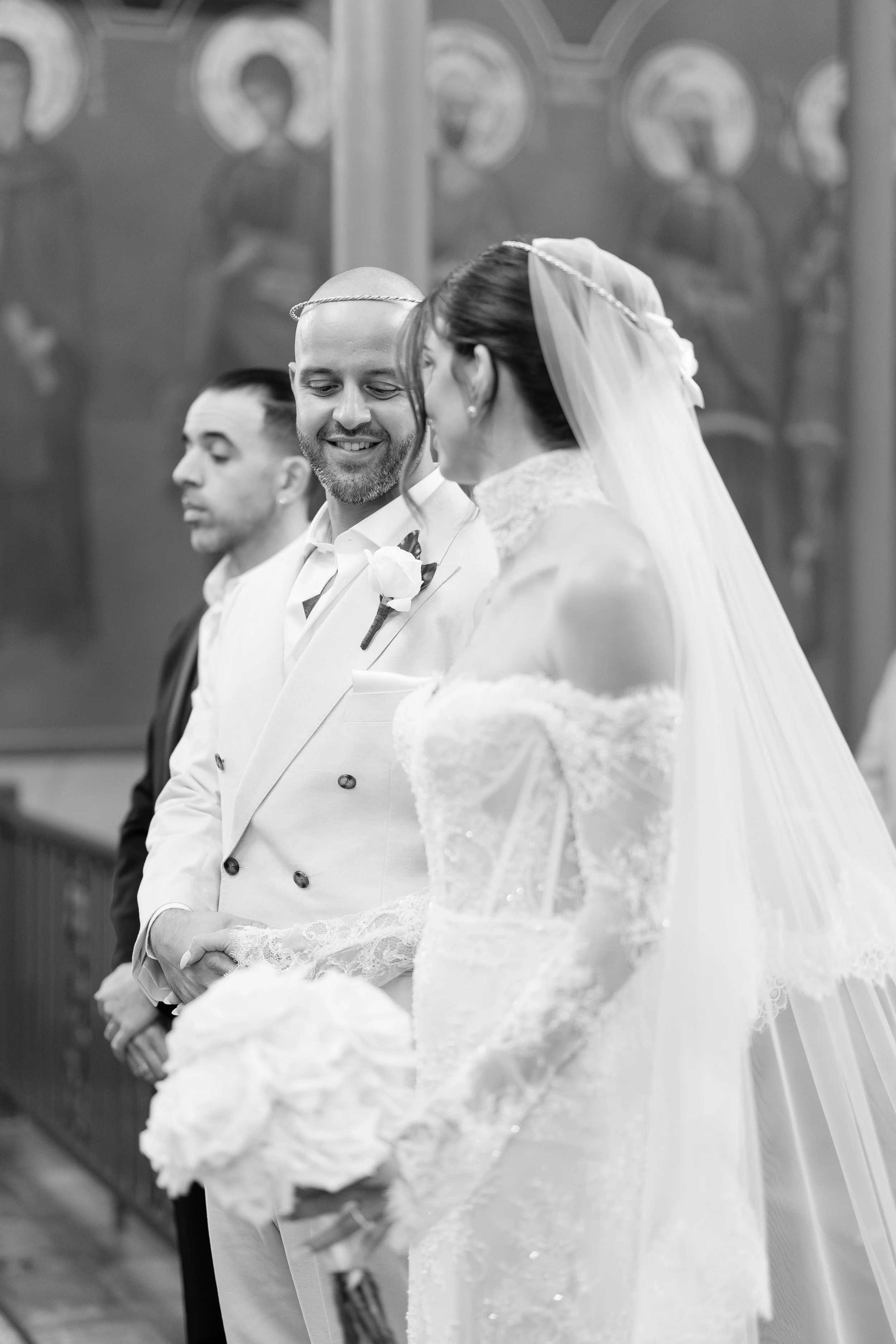Steph and Alex close together in black and white during the ceremony