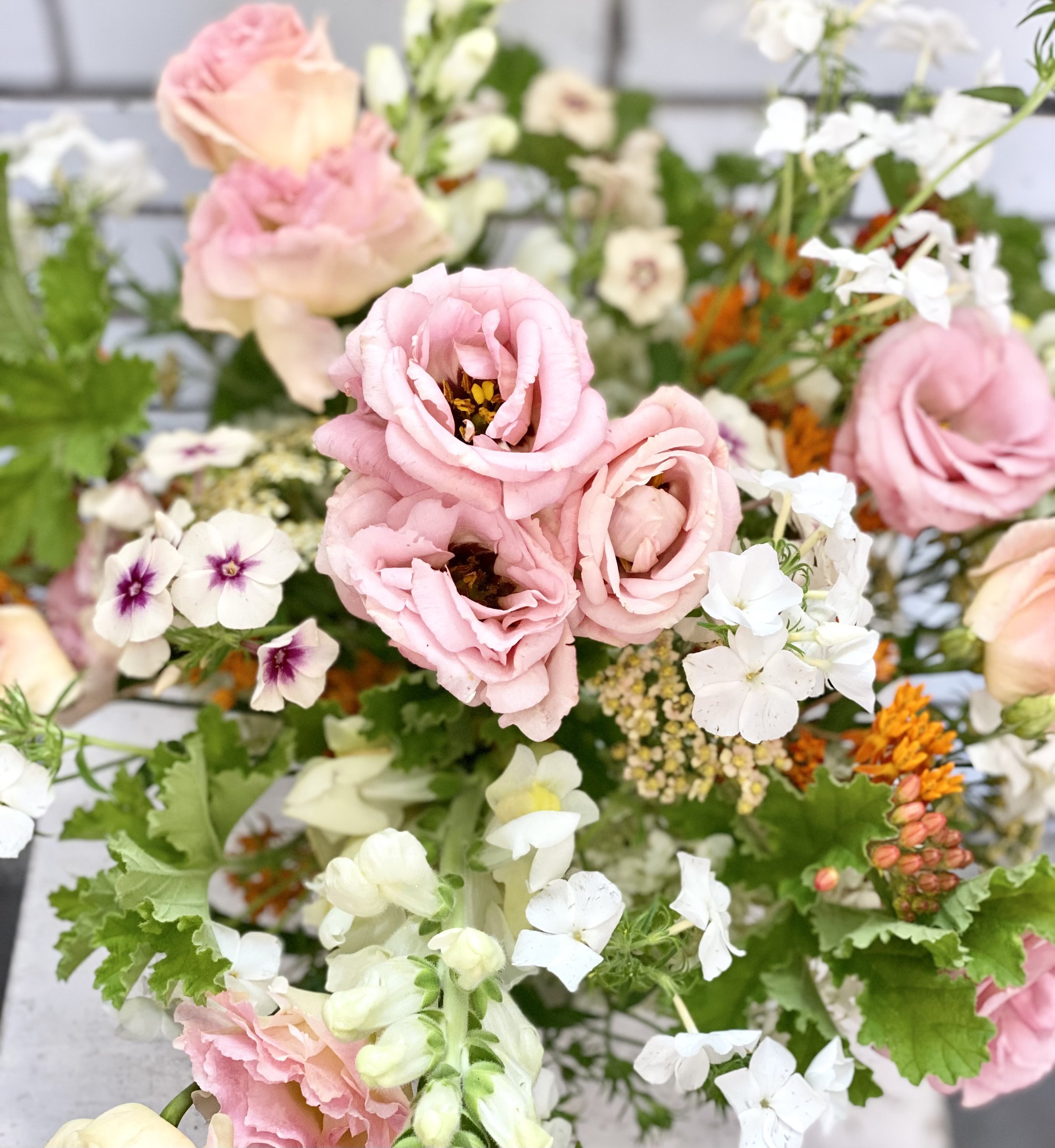 "Captivating Local Flowers in an Artfully Arranged Vase - Discover Nature's Beauty!"