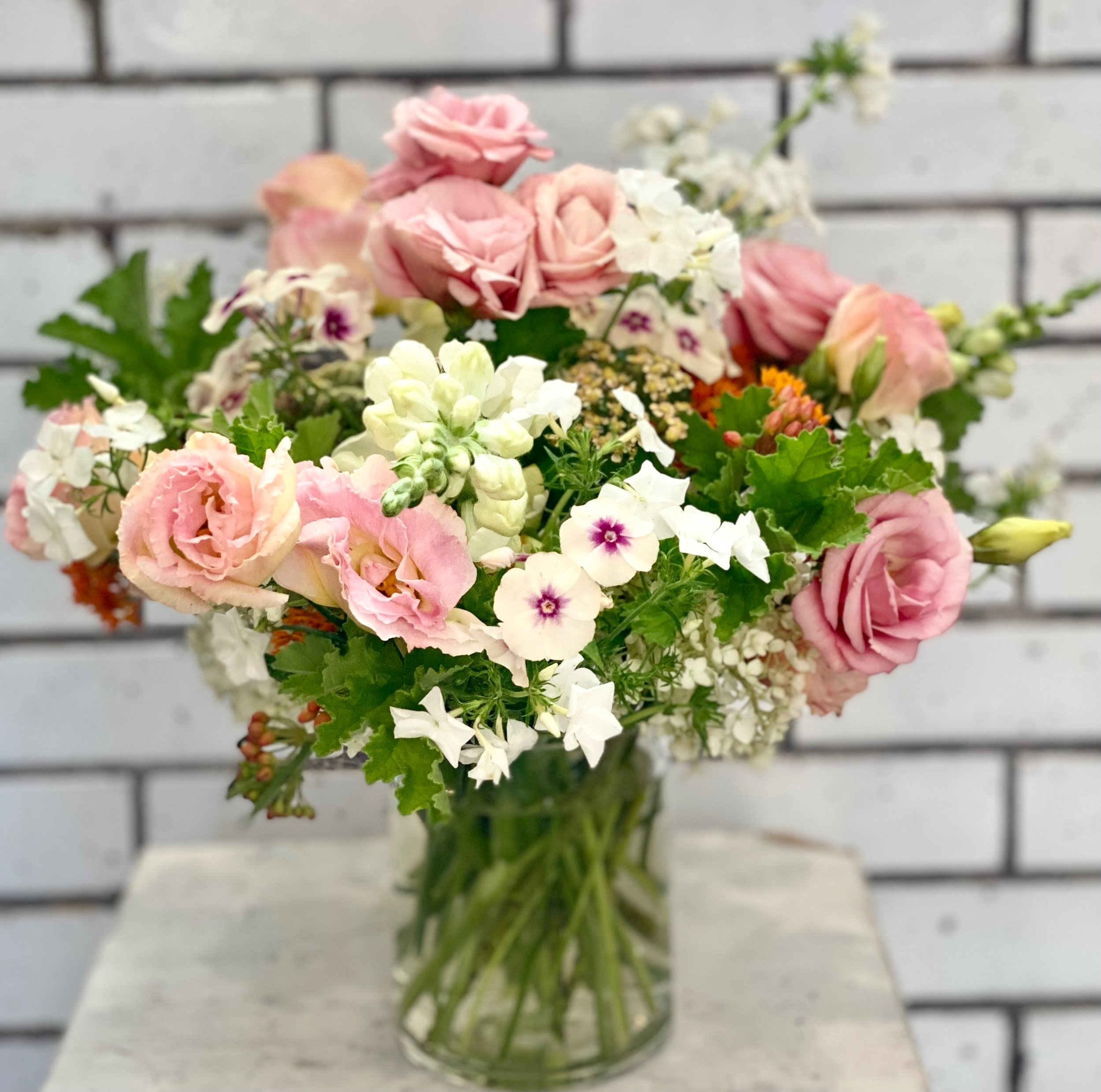 "Captivating Local Flowers in an Artfully Arranged Vase - Discover Nature's Beauty!"