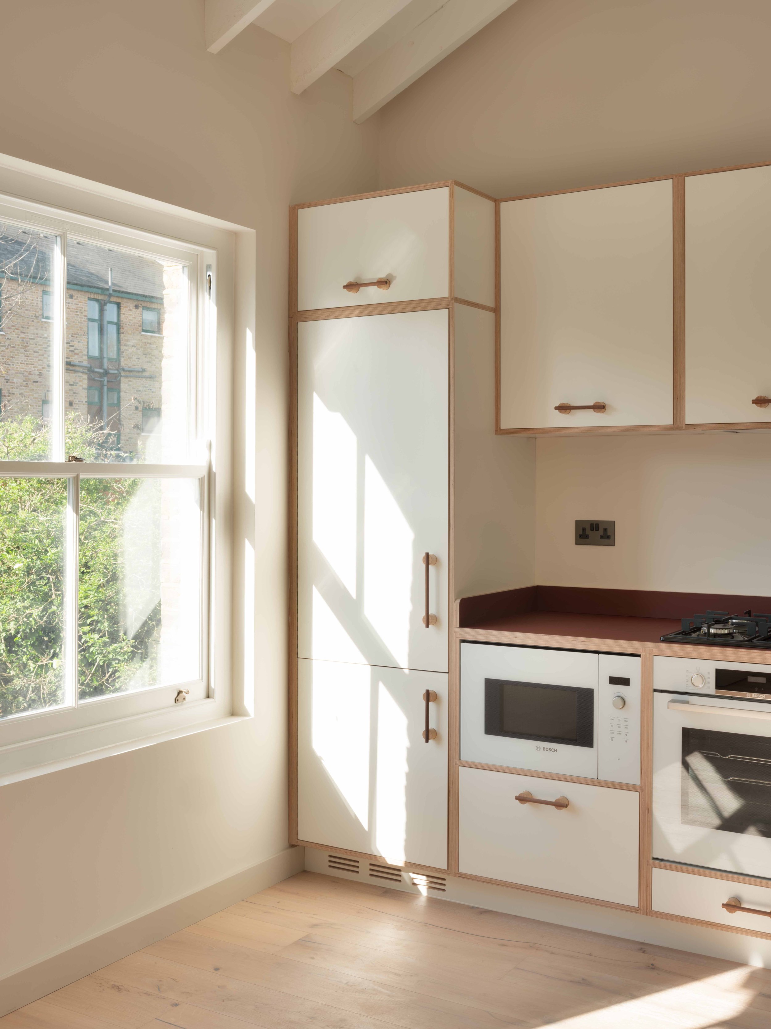 Lozi_plywood_kitchen_Artform_st_marks_rise_flat_3_low-res_2_built-in_kitchen.jpg