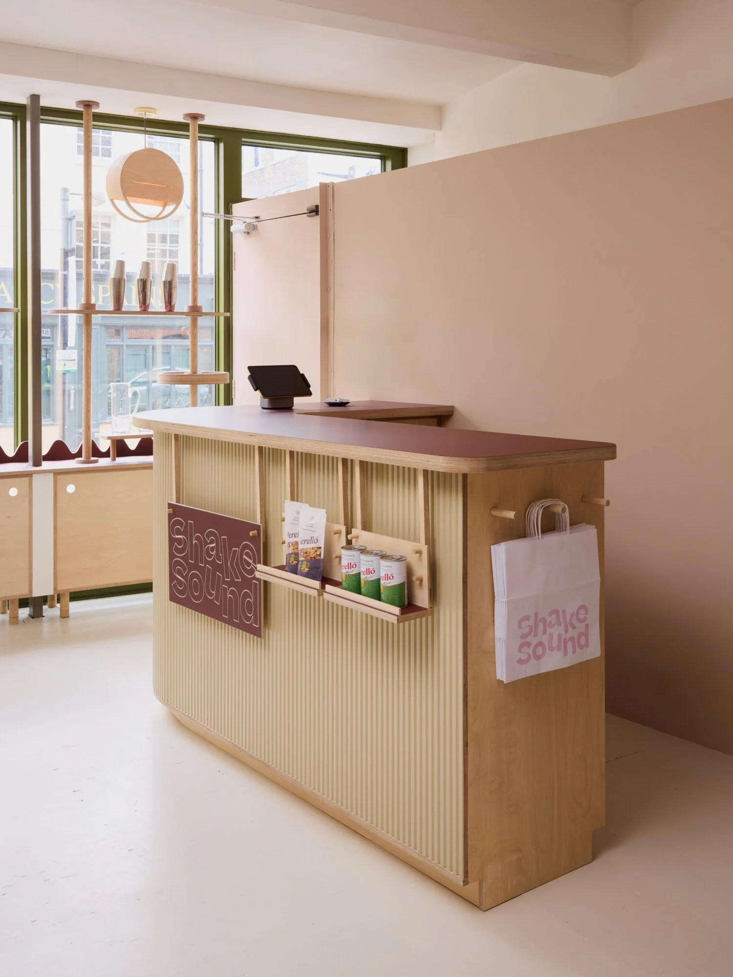 Lozi_plywood_commerical_Shake_Sound_low-res_13_bespoke_retail_storage_till_point.jpg