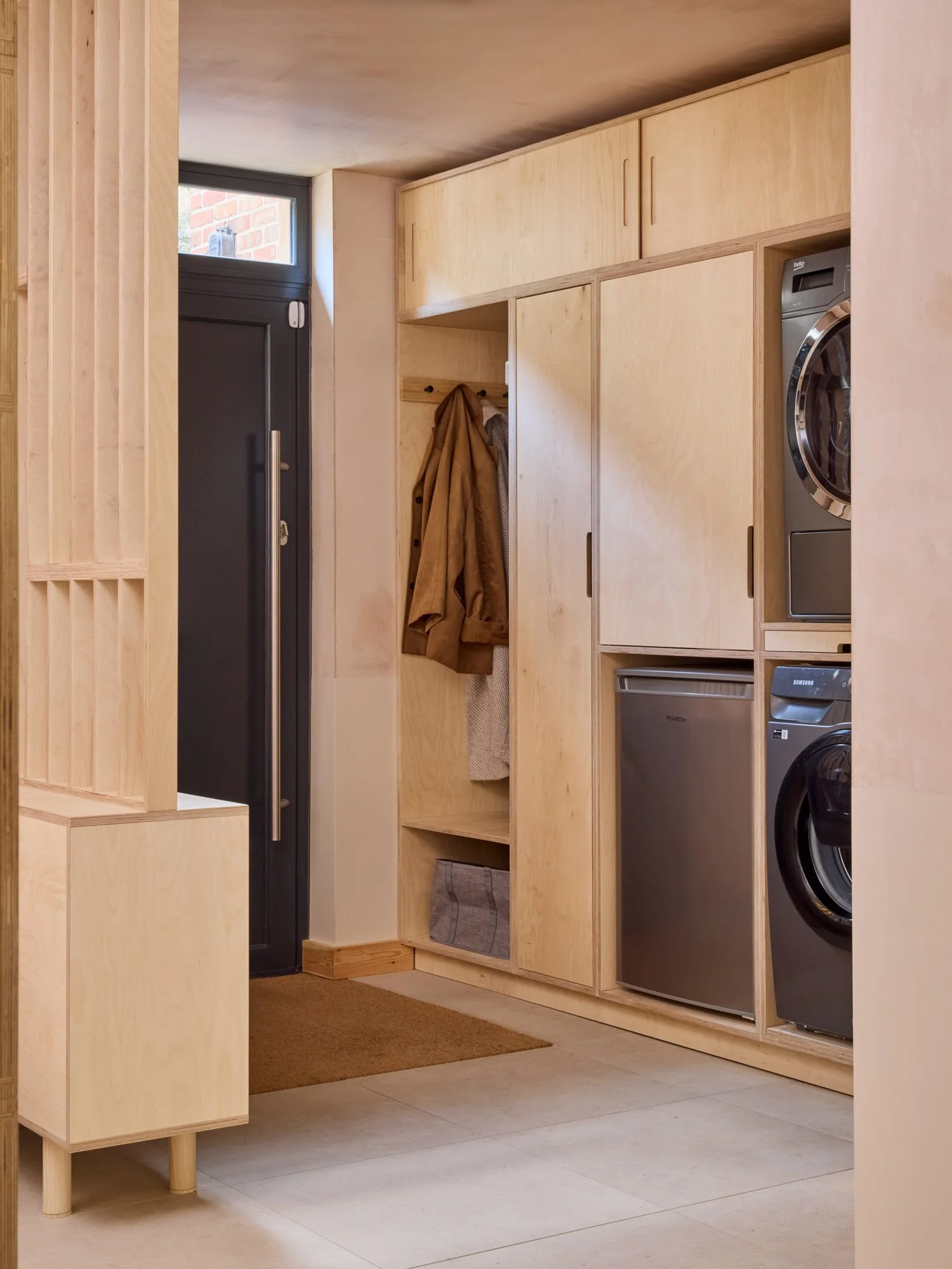 House_of_Lozi_plywood_furniture_Jess_Holly_low-res_05_bulit_in_plywood_hallway_storage.jpg