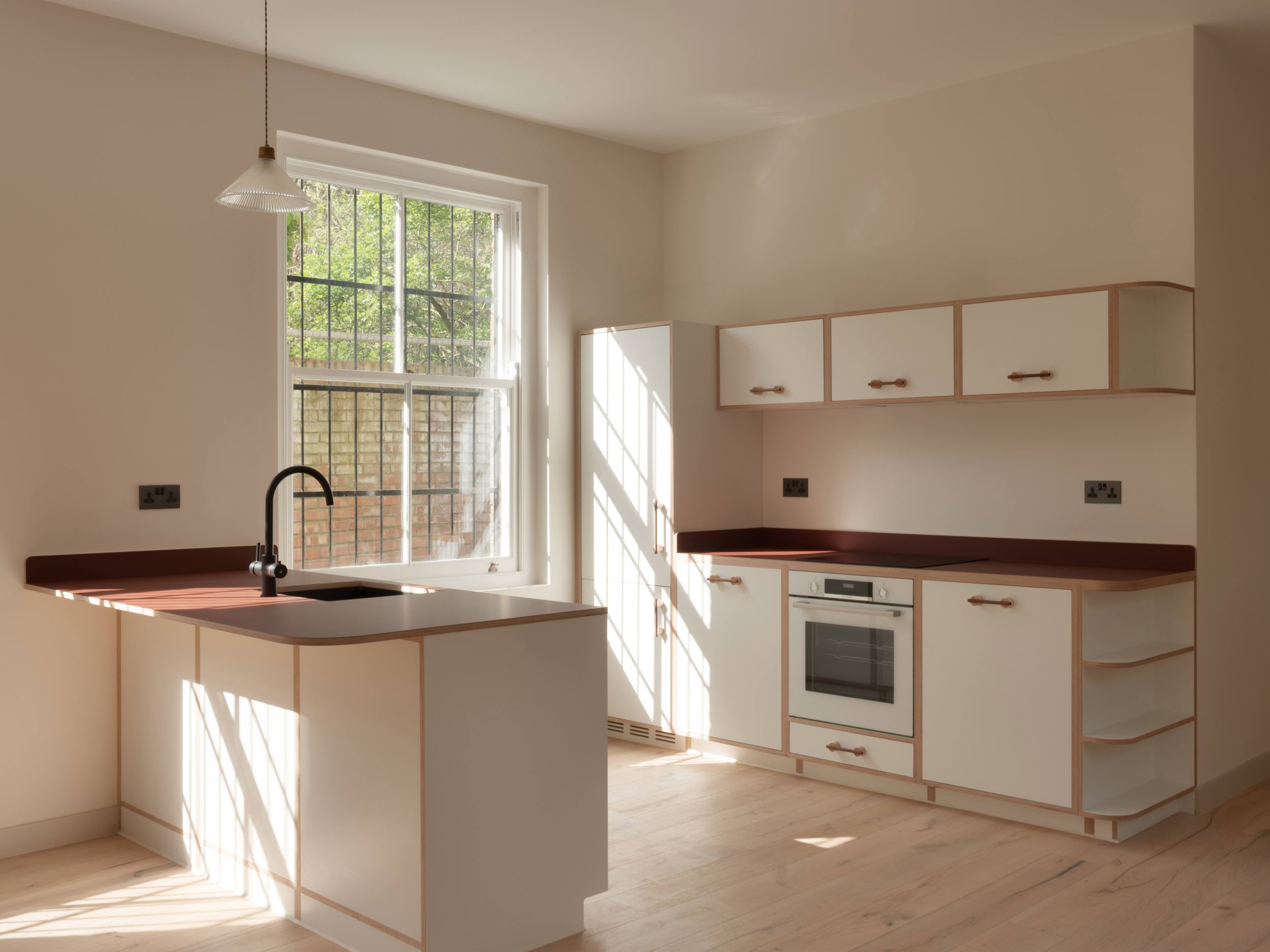 Lozi_plywood_kitchen_Artform_st_marks_rise_flat_2_low-res_1_built-in_kitchen.jpg