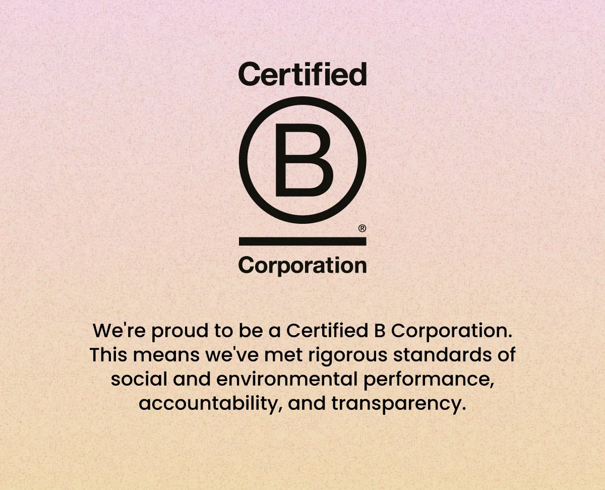 A certification poster with a beige and pink gradient background displaying the Certified B Corporation logo and a message about meeting standards of social and environmental performance, accountability, and transparency.