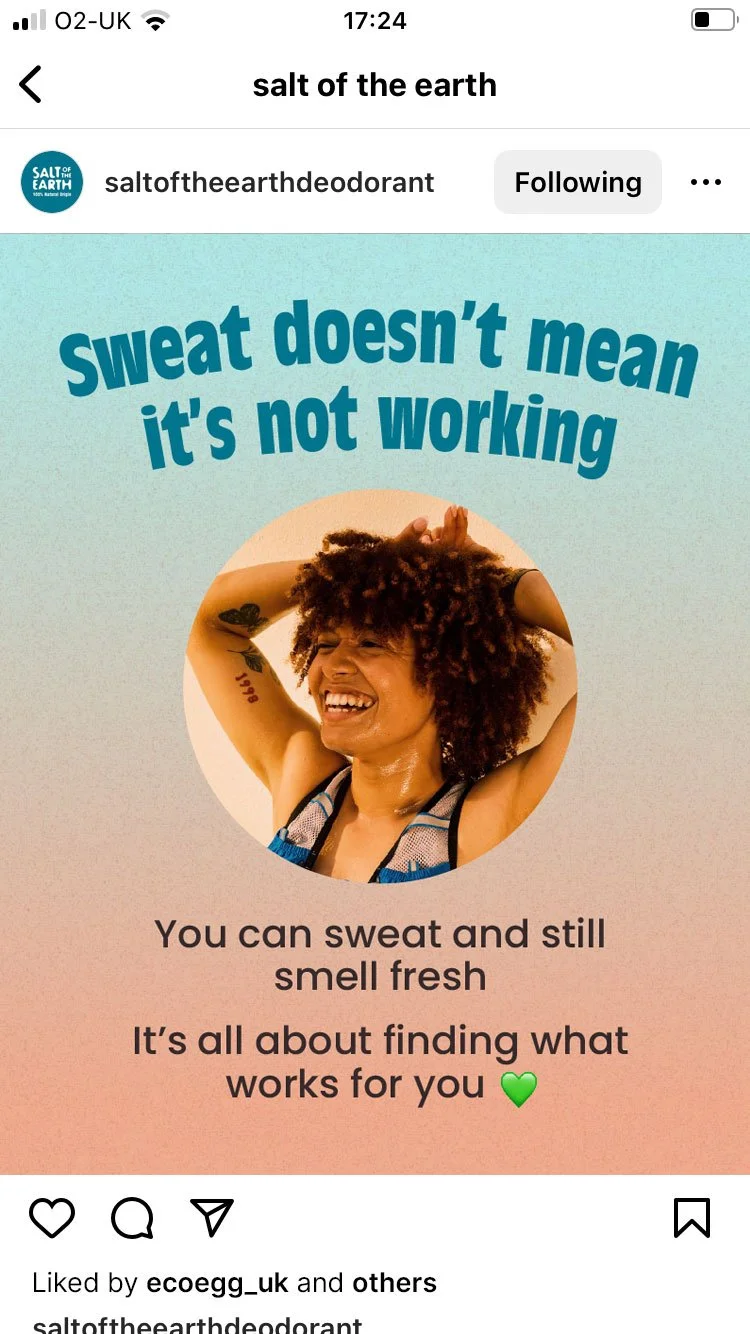 A woman smiling and sweating with her hands behind her head, promoting deodorant, with text that says 'Sweat doesn't mean it's not working,' and additional text about sweating and smelling fresh.