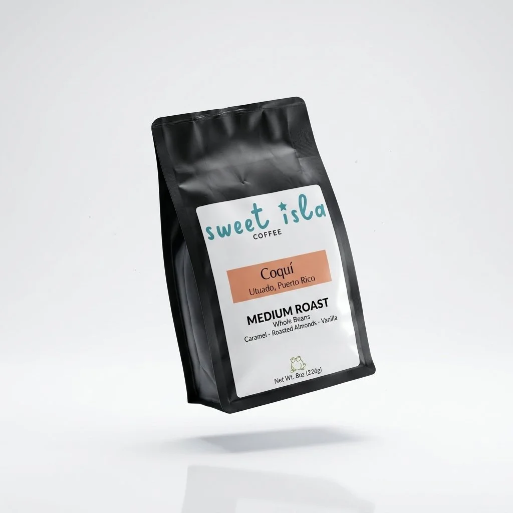 A bag of Sweet Isla Coffee, Coquí Medium Roast, Utuado, Puerto Rico, 8oz, with flavor notes of caramel, roasted almonds, and vanilla, against a white background.