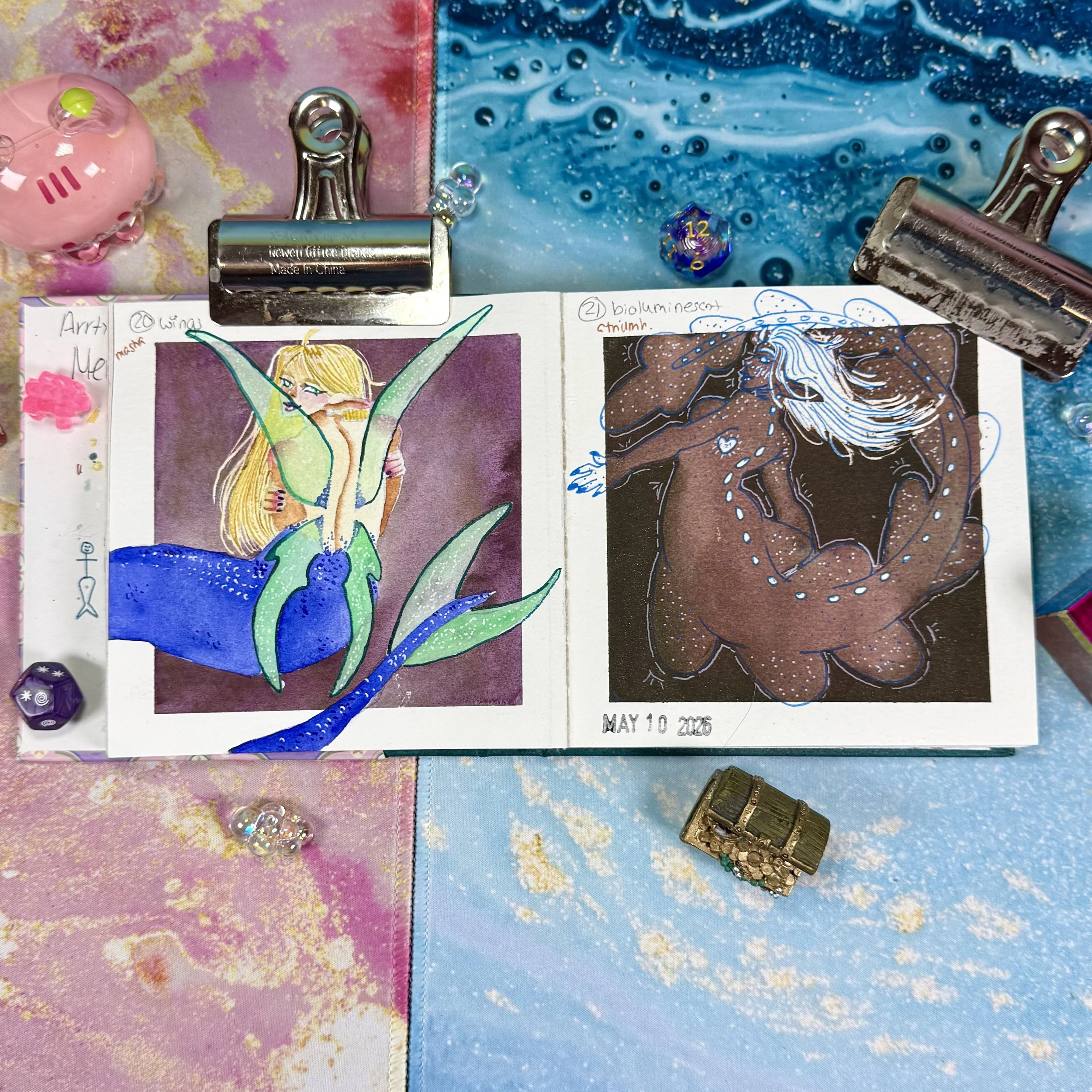 a mermaid with sparkly wings and a bioluminescent mermaid