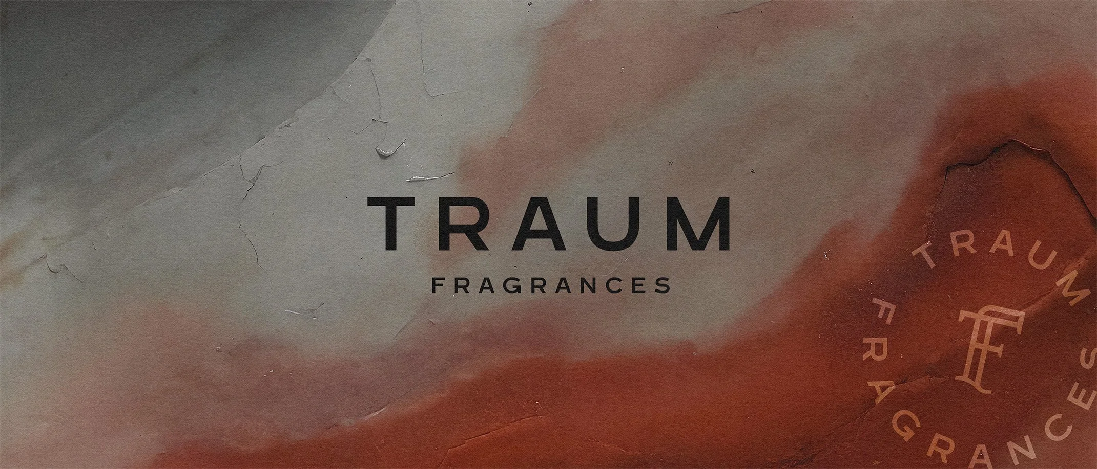 Packaging label for traum fragrances with a textured background of muted gray, white, and reddish-brown tones.