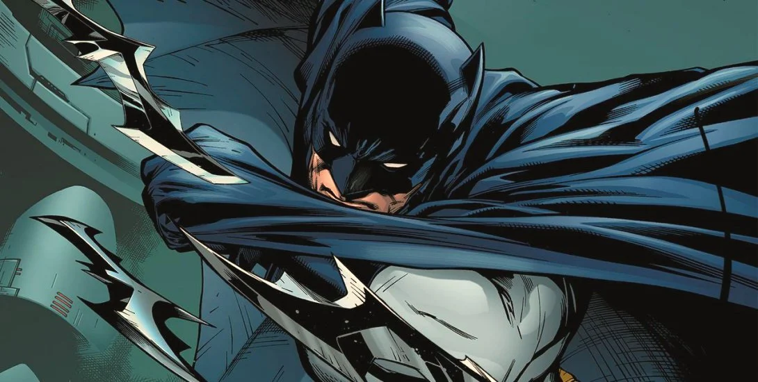 Batman comic the caped crusader throws batarangs