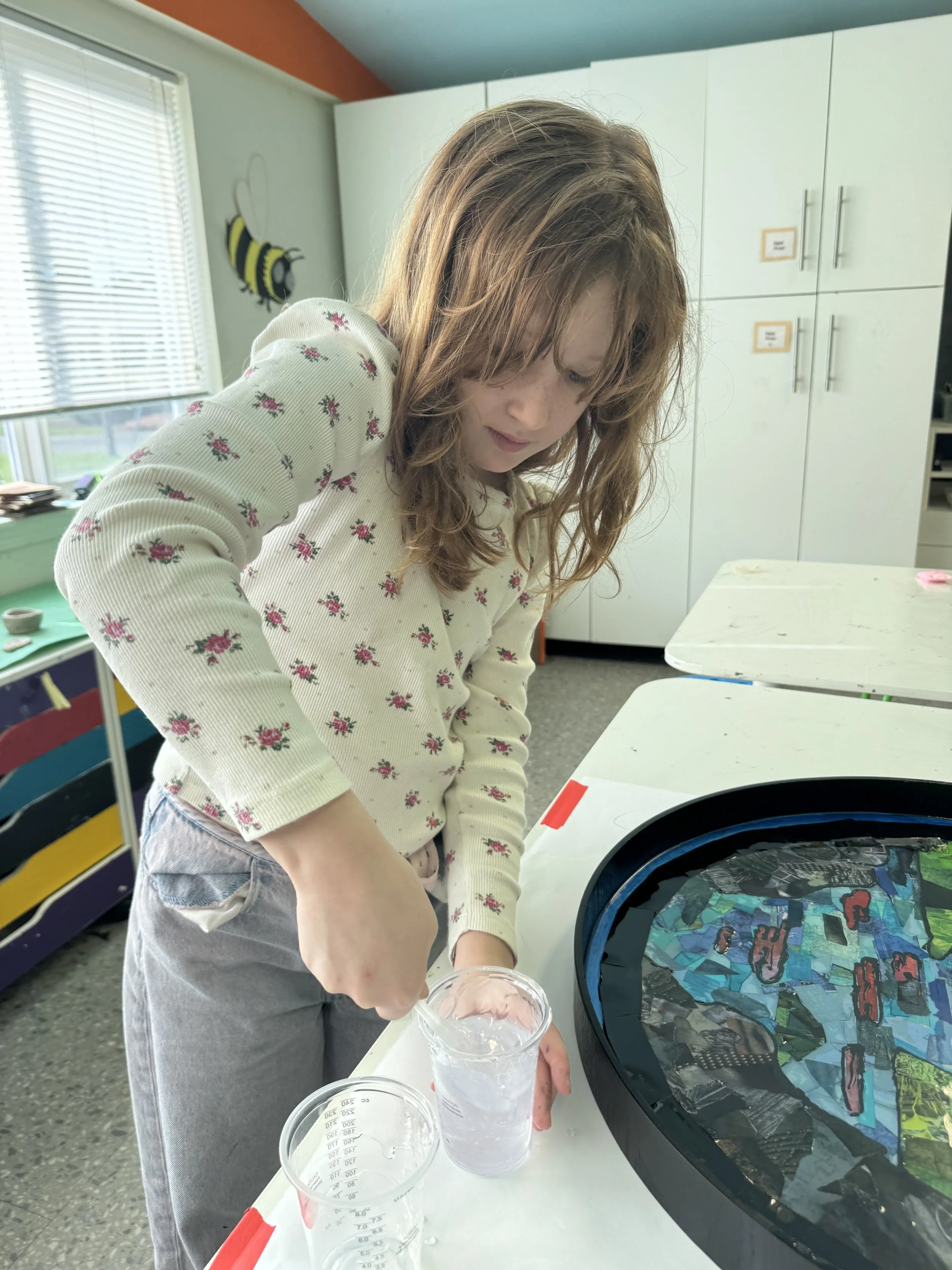 Child working on art piece