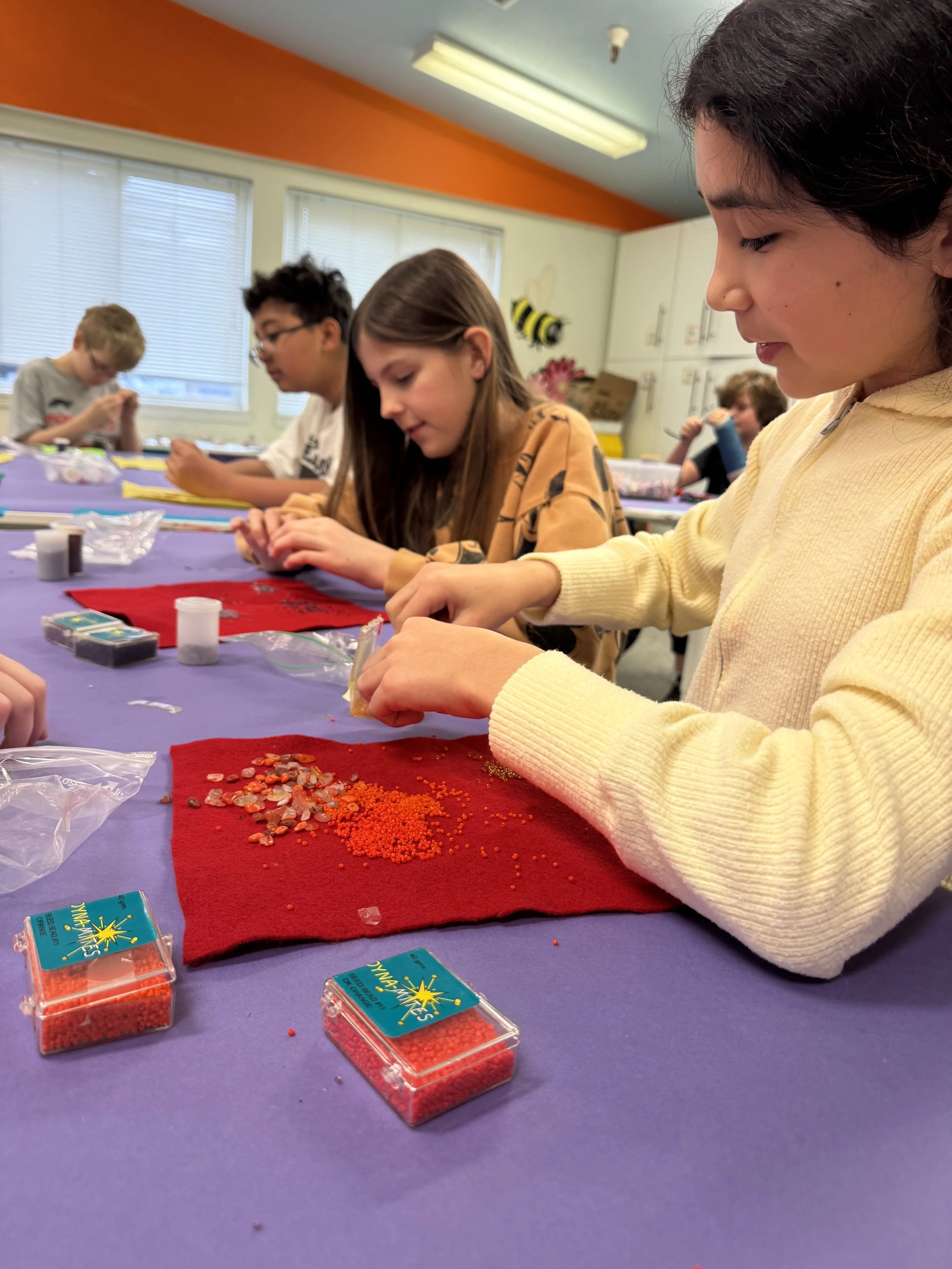 Children working on art piece