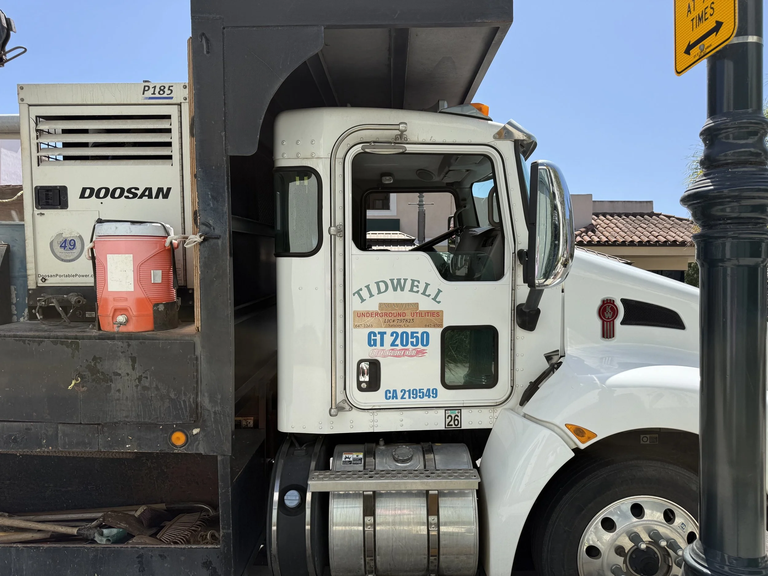  Tidwell Excavating dump truck (Underground Utilities, GT 2050) parked at the site. 