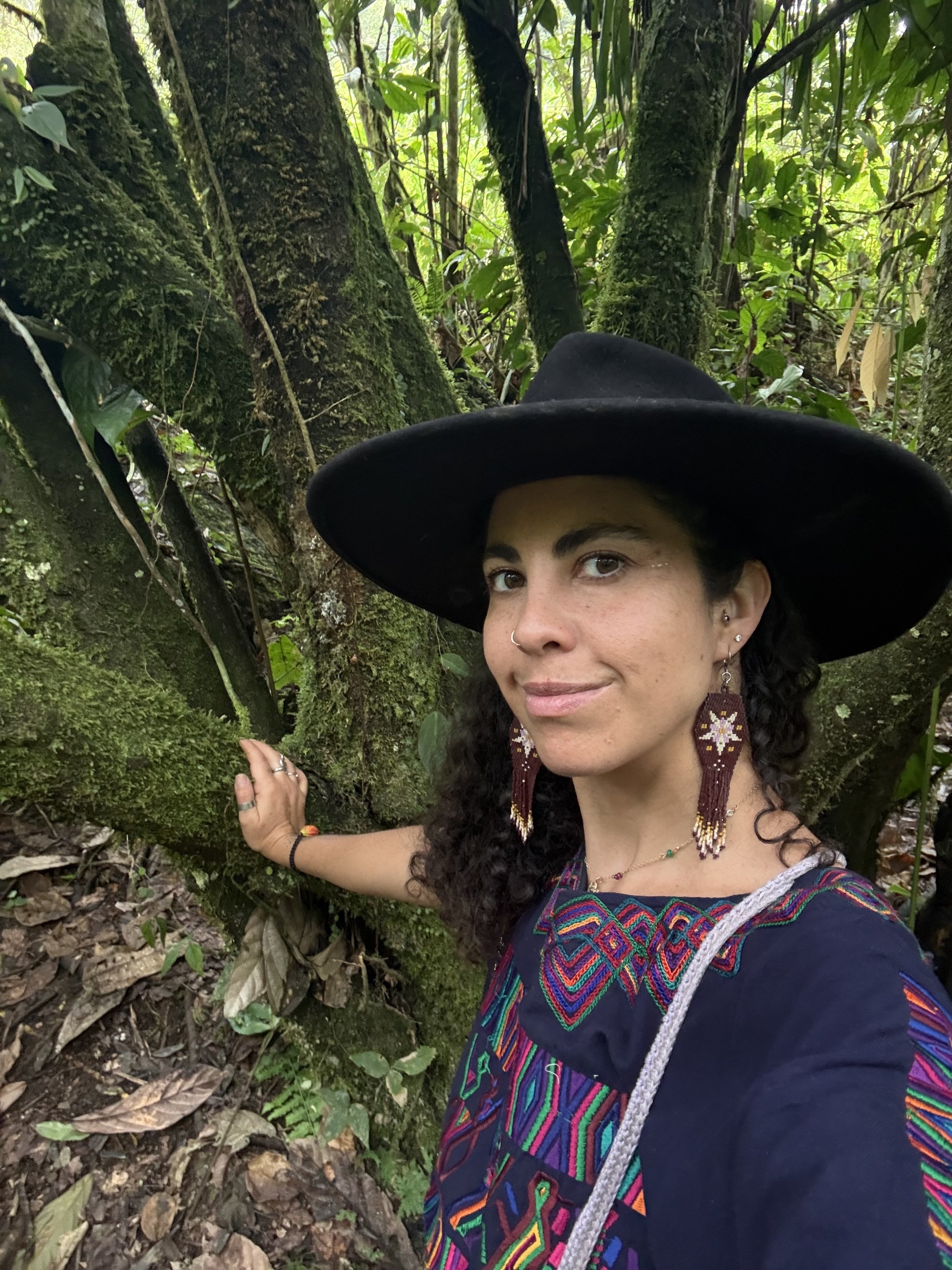 Dia next to ancient grandmother cacao tree