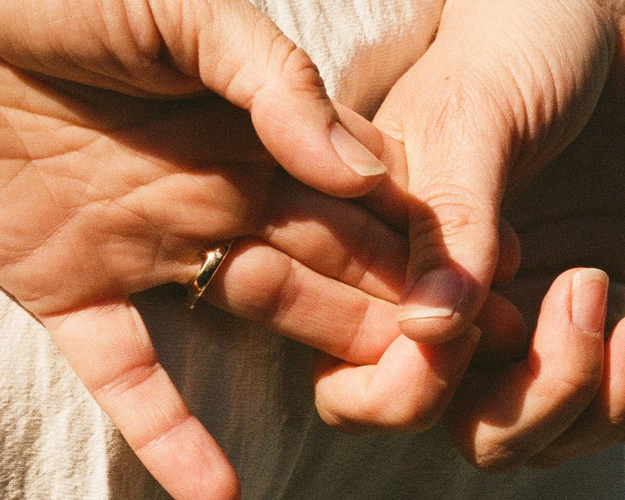 Detail of hands and wedding ring on a wedding day in Kansas City, MO