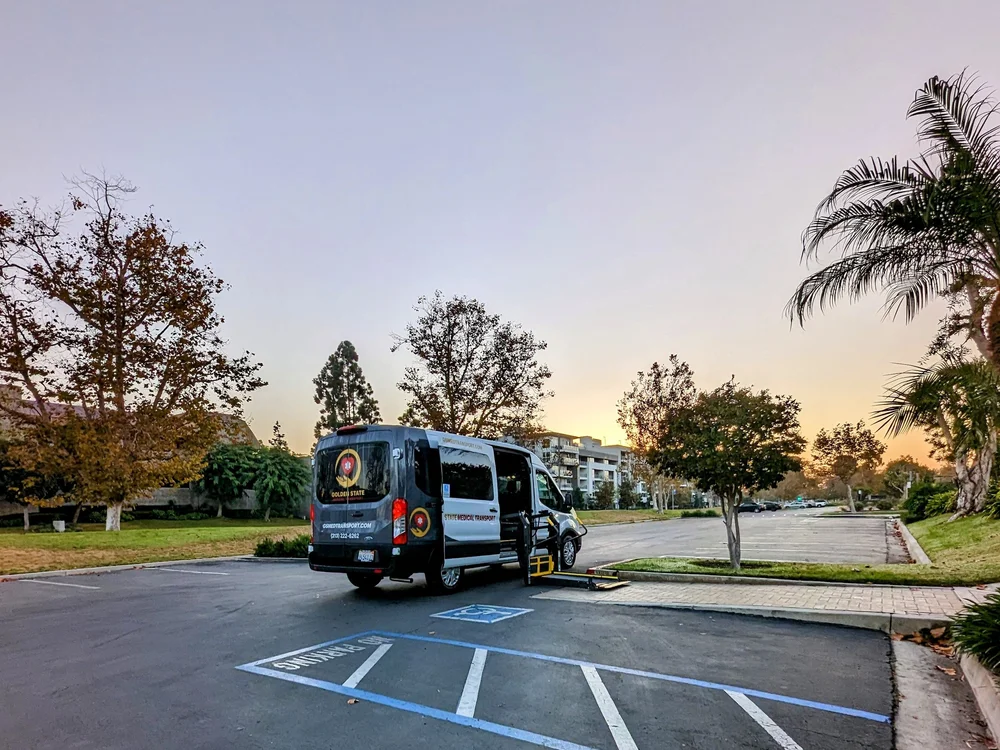 Wheelchair van with the lift lowered at the curb
