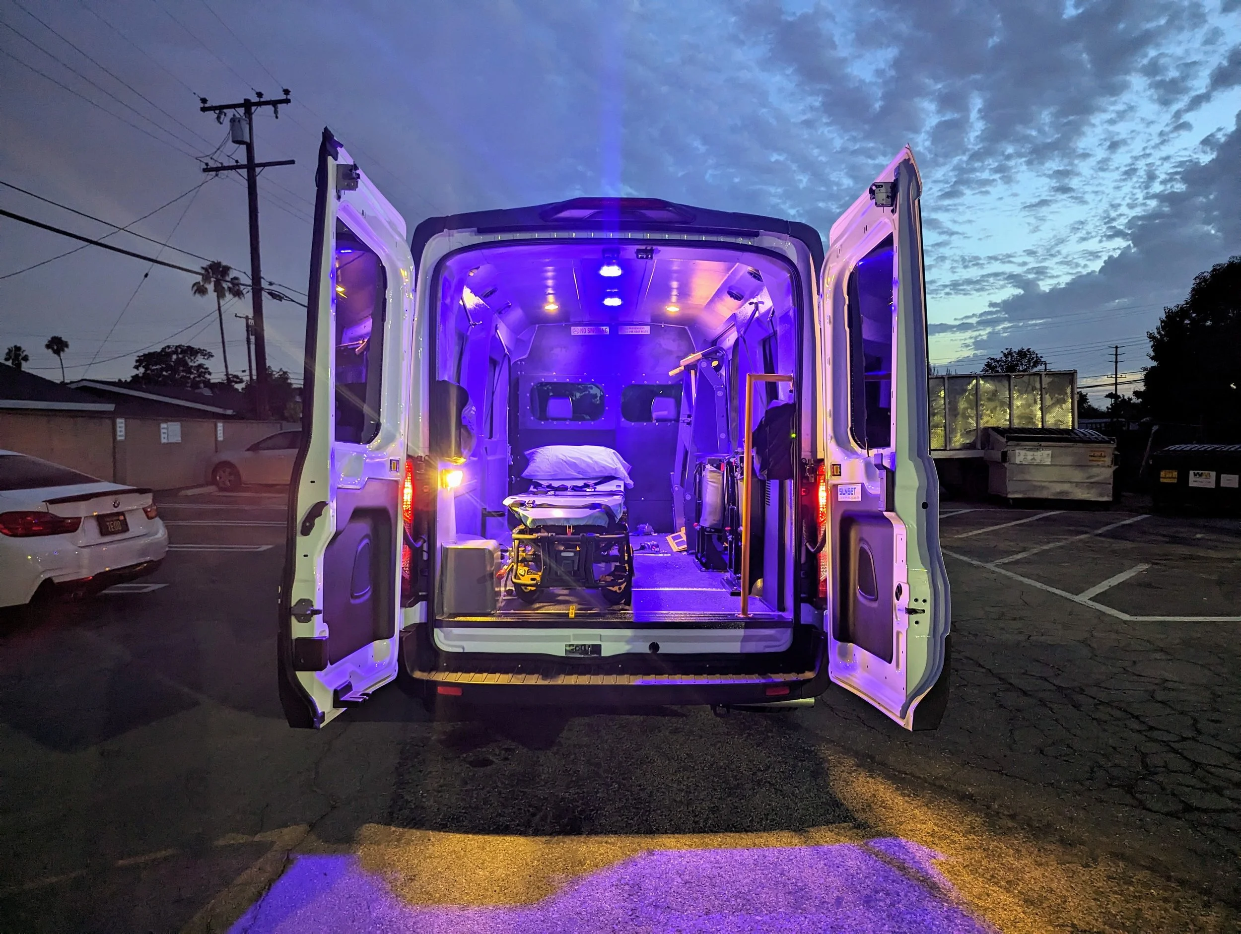 Gurney secured inside a Golden State Medical Transport van