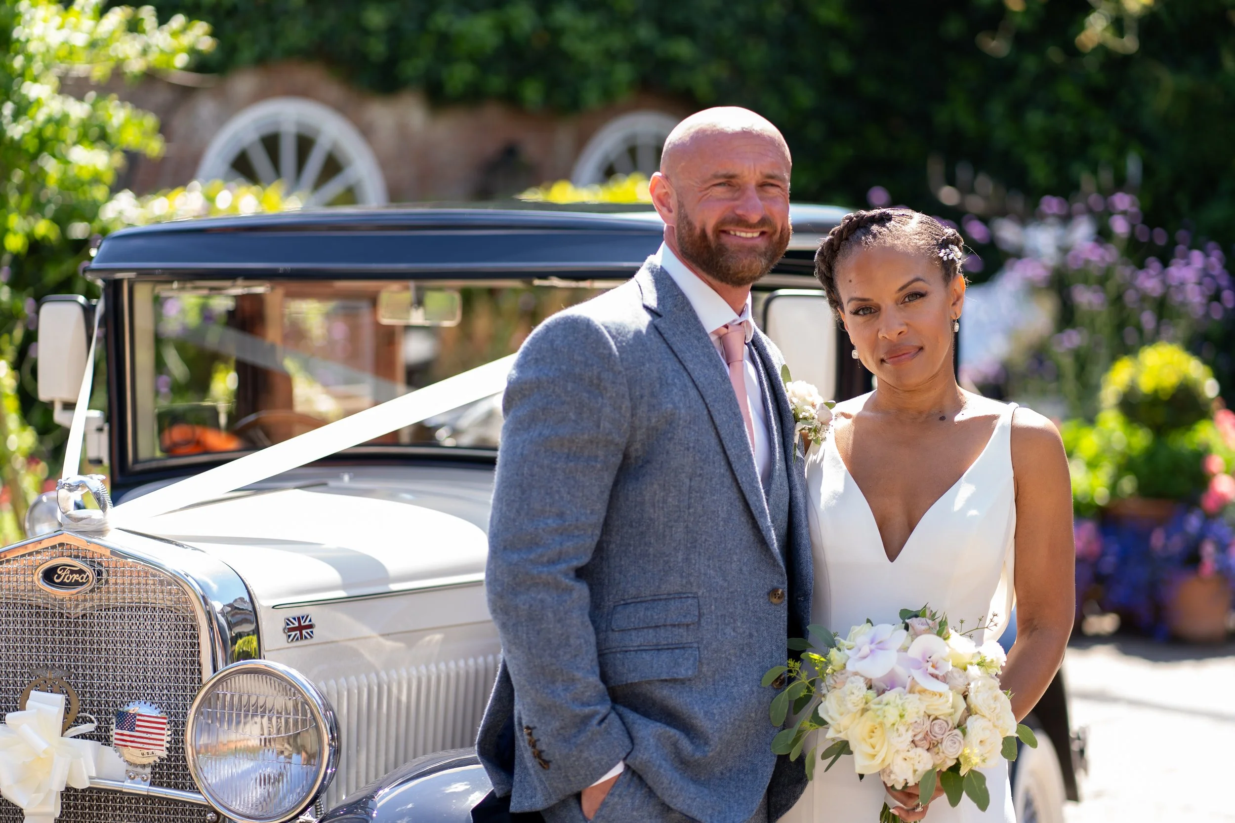 Beautiful sunny day at the Chewton Glen Dorset, our bride and groom embracing in their wedding day, absolute joy being their photographer.