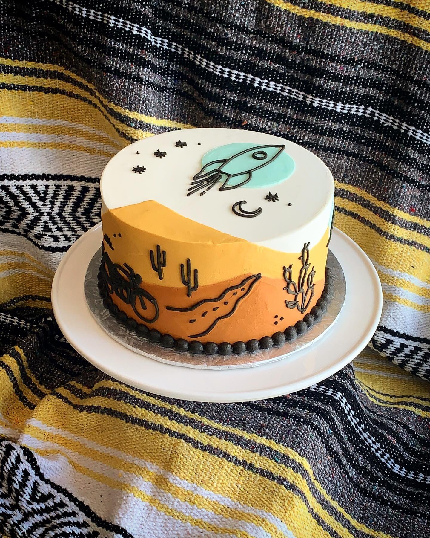 A double birthday cake for two of earth&rsquo;s coolest inhabitants @buildarocket13 &amp; @covecabin 💛🧡🤎

Citrus cardamom cake with buttercream filling and decoration. A forgery on the theme of artist @prescottmccarthy &lsquo;s beautiful water tow