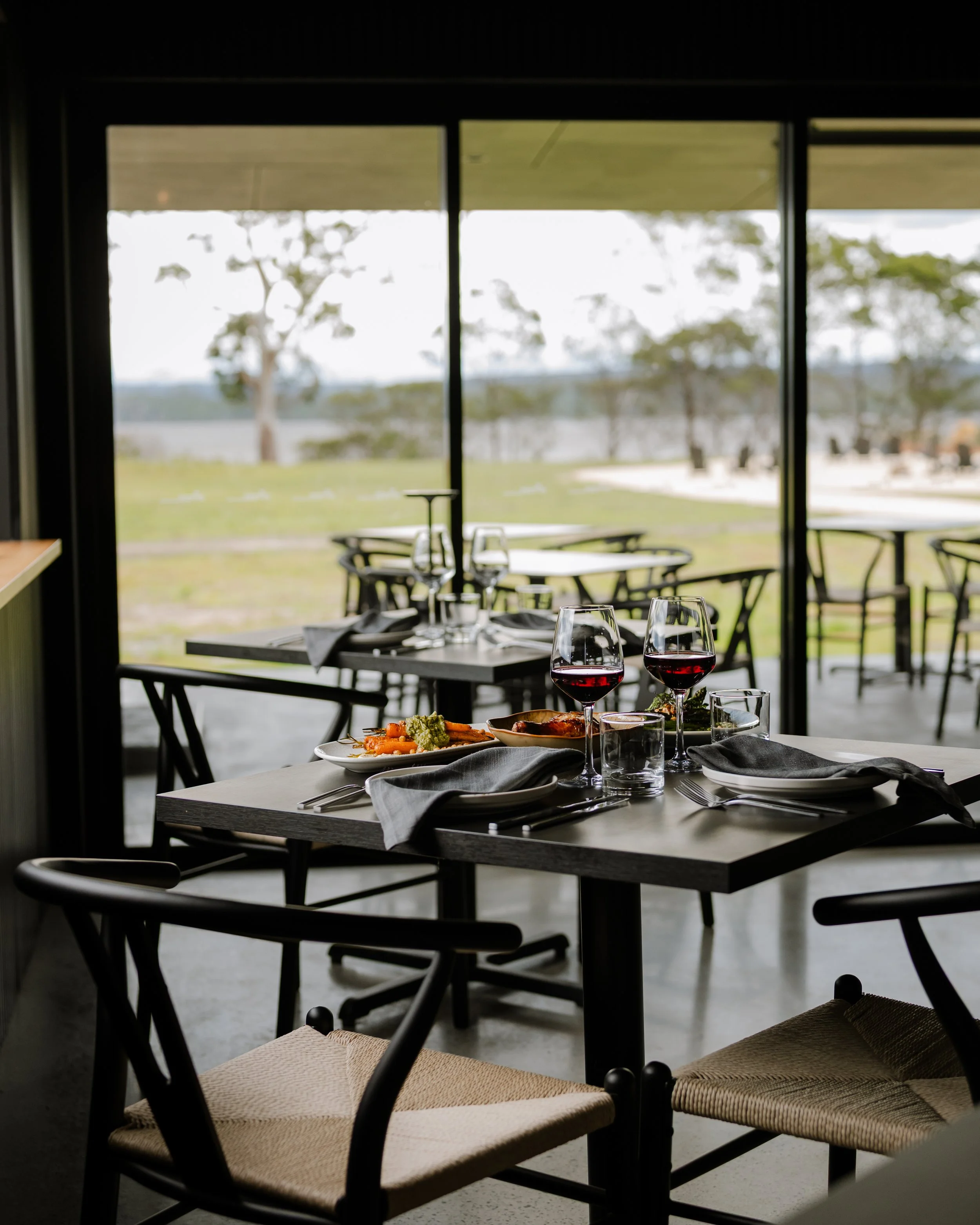 Lunch and red wine at WADE restaurant overlooking Moulting Lagoon, Freycinet