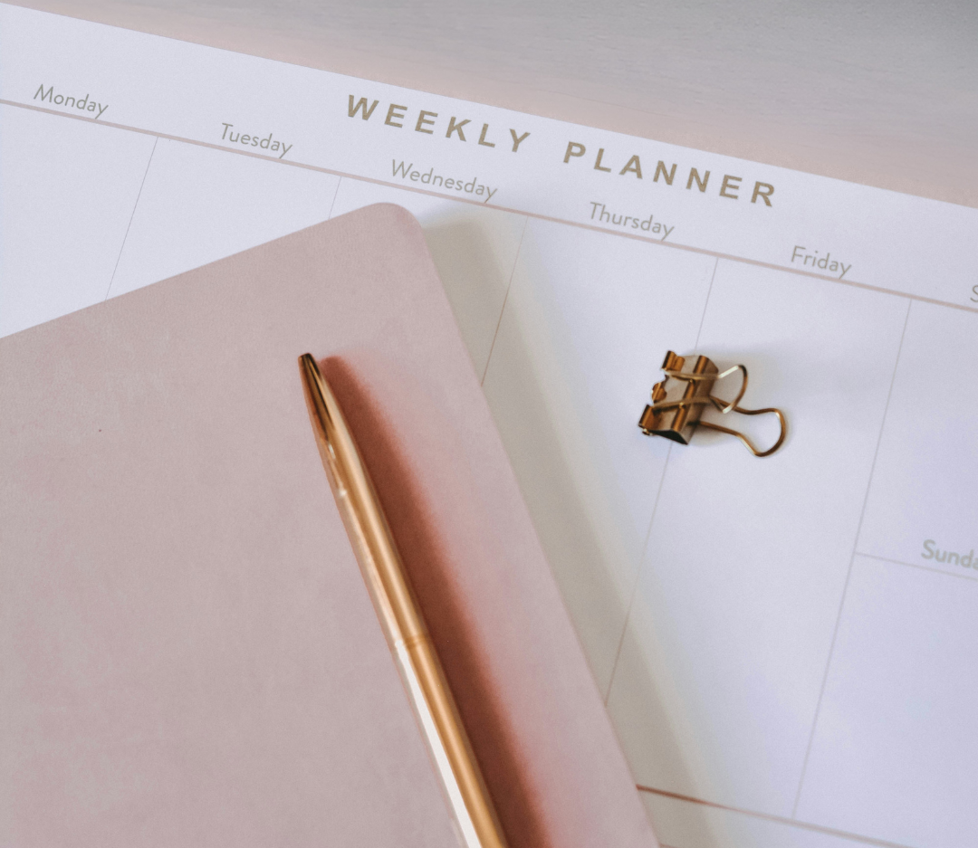 Weekly planner and pen