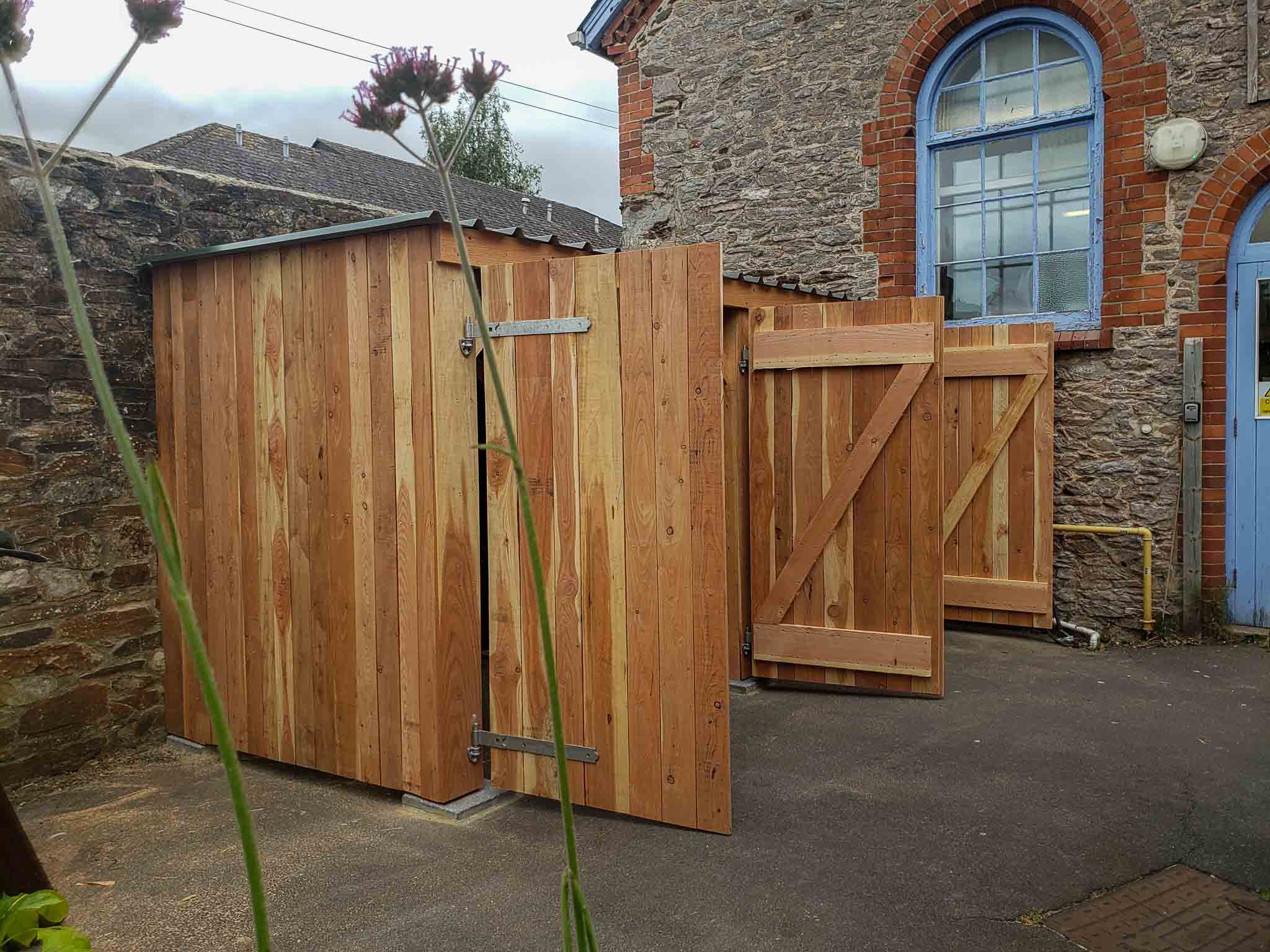Wooden bike shed. Made from local Larch and Douglas Fir.