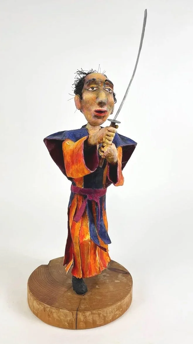 2022, Samarai, 15" x 6" x 6", Paper, Wire, Tape, Paste, Varnish, Acrylic, on Wood Base.