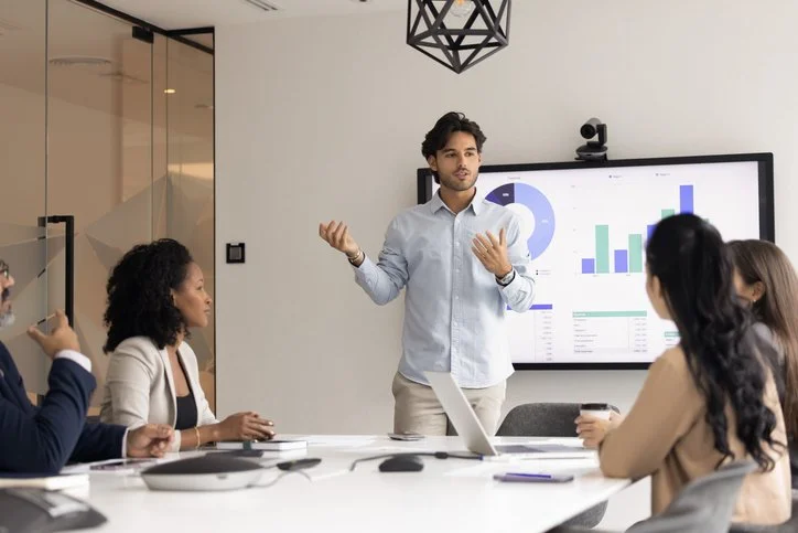 International professionals discussing business in a multicultural meeting