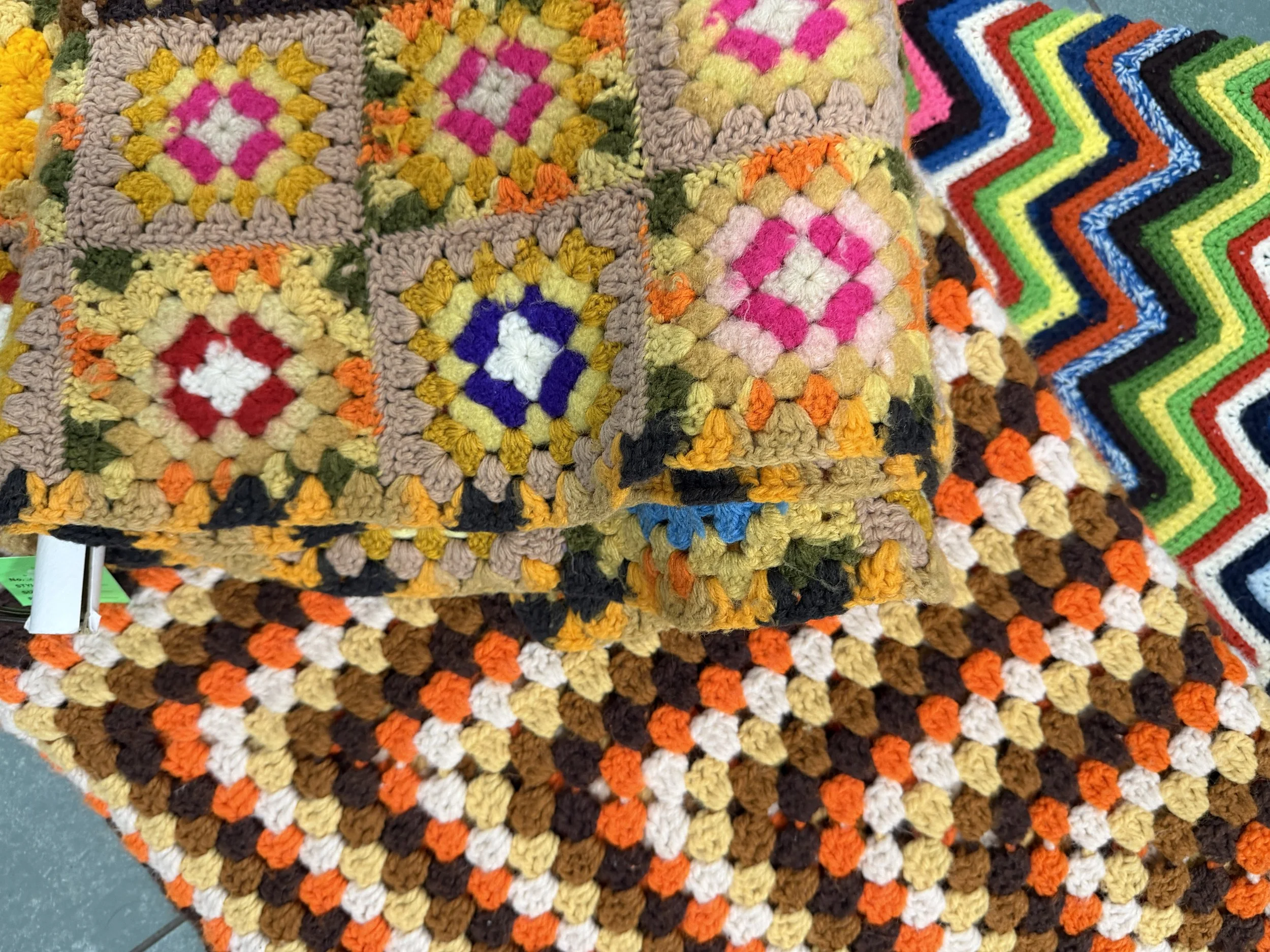 Handmade thrifted afghans and quilts for sale at House of Hope Resale.