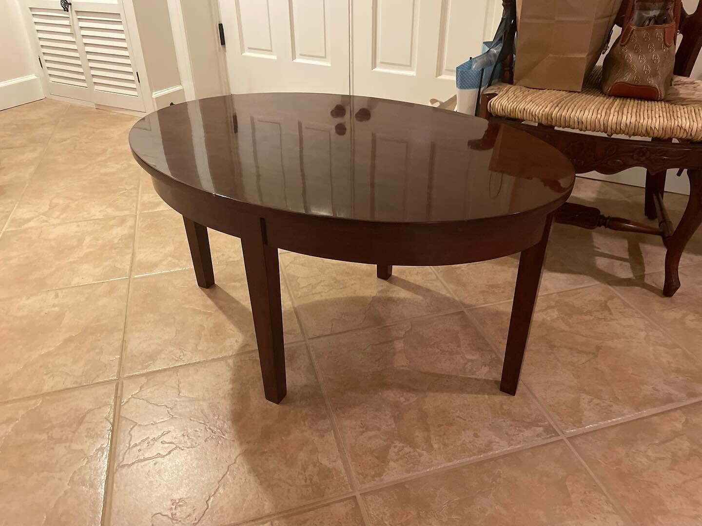 Cocktail table hand crafted by one of our volunteers and a nationally recognized woodworker. Solid cherry.