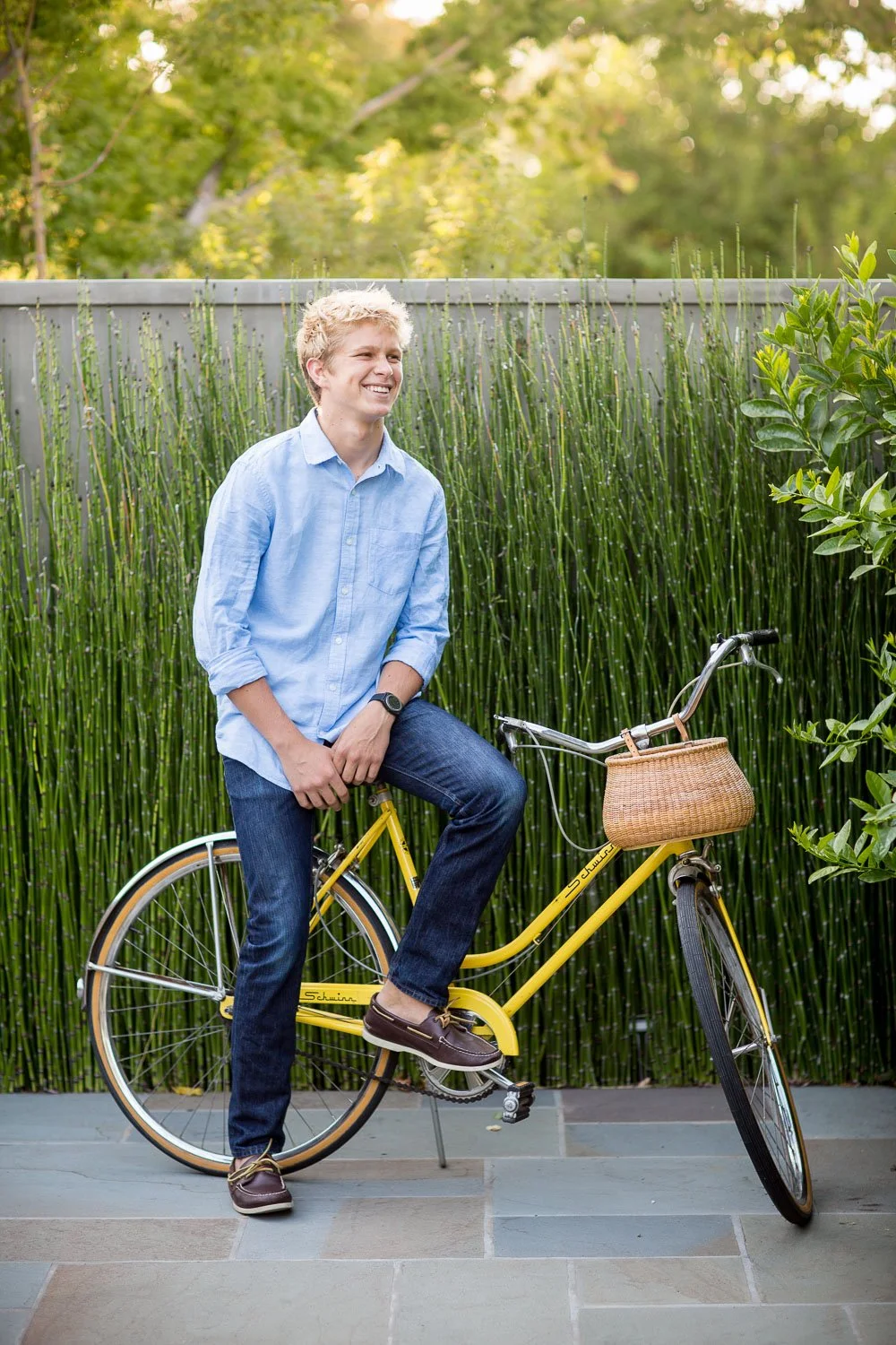 Student on yellow bicycle outdoors in San Francisco Bay Area during commercial lifestyle shoot for cycling and college brands
