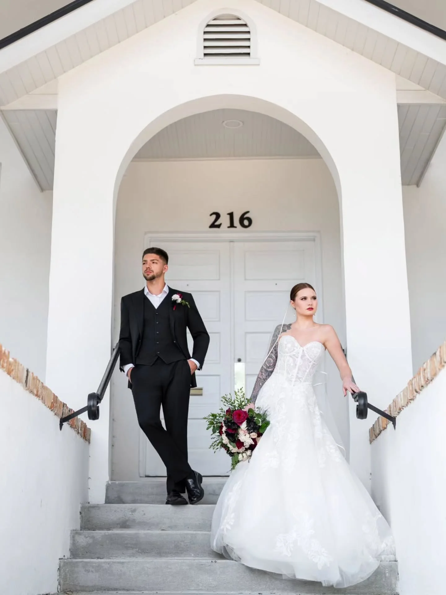 《 Front steps, front cover. 🖤 Outside Chapel &amp; Cellar, these two aren&rsquo;t just posing, they&rsquo;re headliners. Effortless elegance, timeless style, pure editorial energy. 》

Vendor Team ✨
Venue &ndash; @chapelandcellar
Planner &ndash; @all
