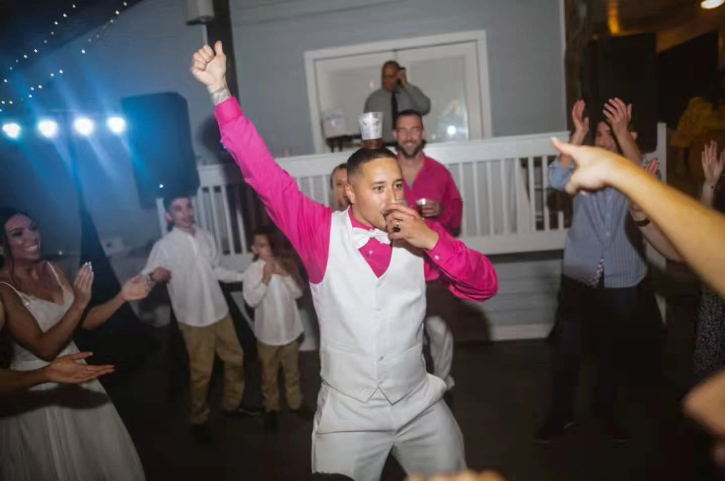 《 Every wedding has that turning point. The formalities are done, the ties are loosened, and suddenly the groom is double-fisting&hellip;one drink in hand and one balancing on his head like a crown. 👑 That&rsquo;s not just a reception, that&rsquo;s 