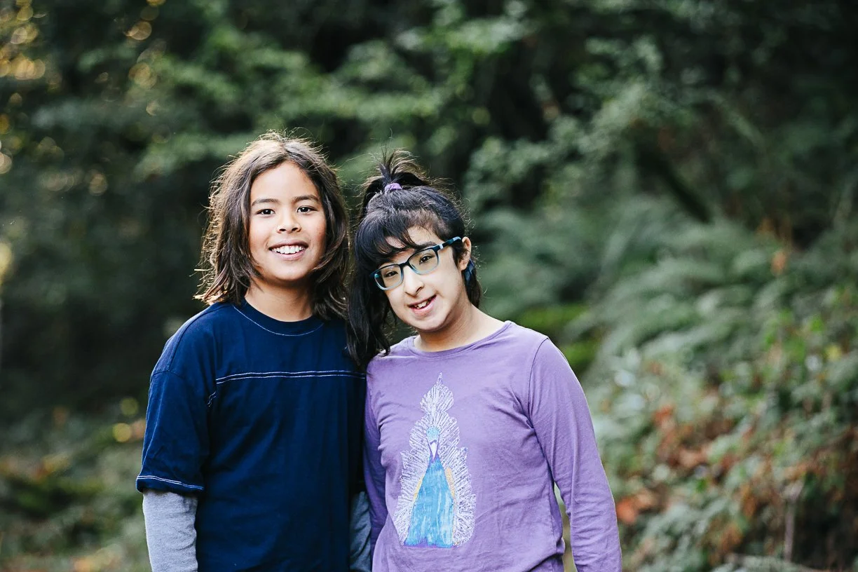Mixed-race siblings, one with cerebral palsy