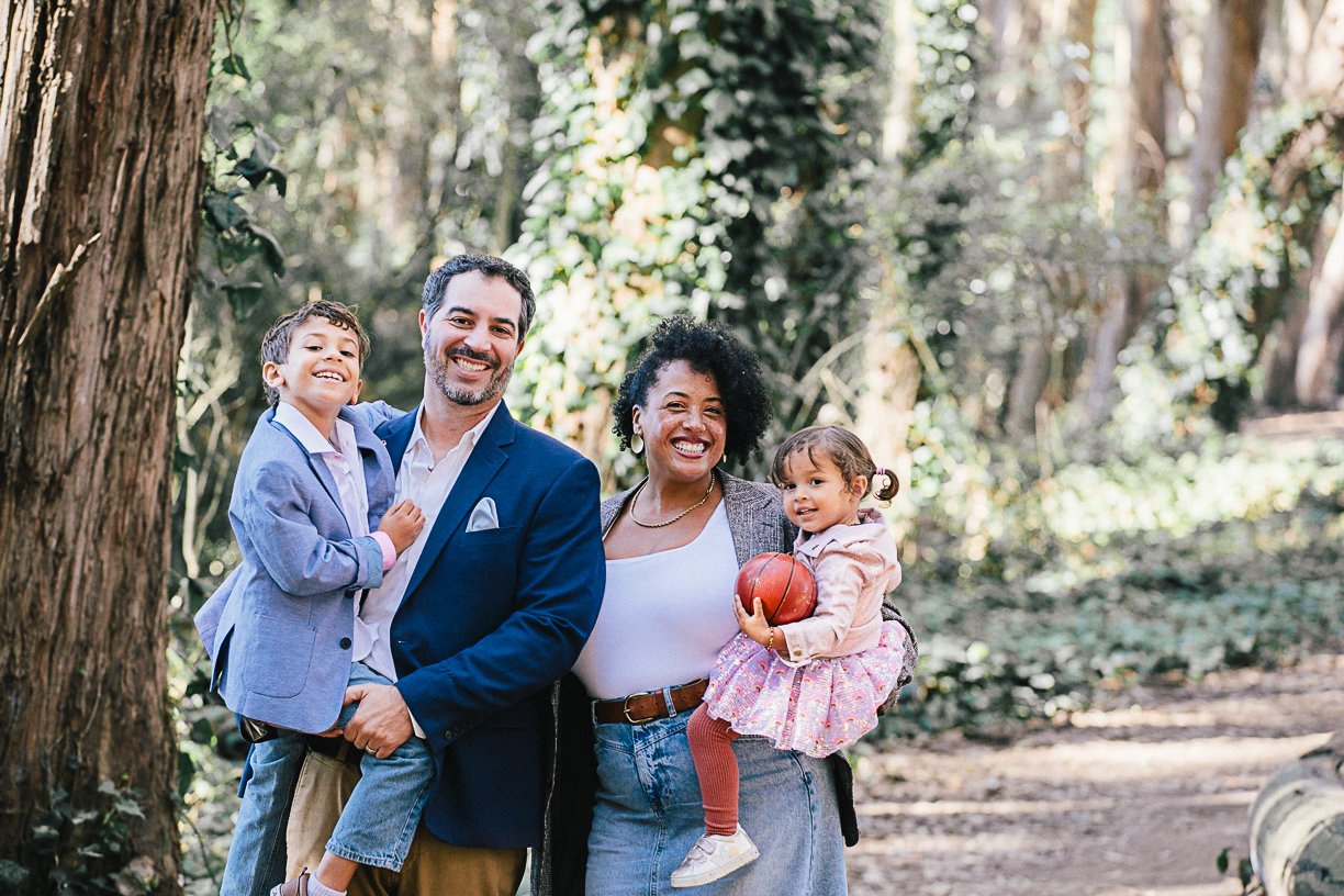 Happy mixed-race family in nature in California