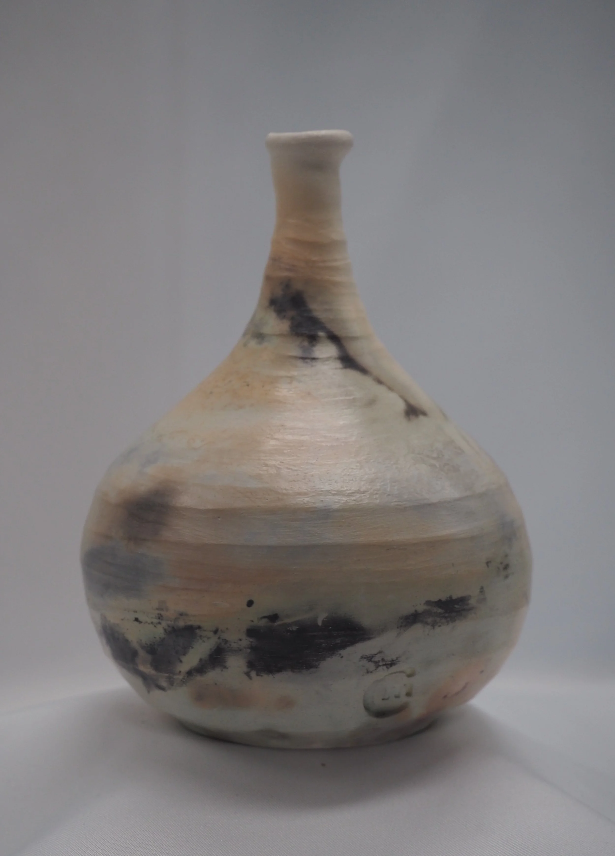 Test small vase 3 - 12 cm high.  
From the 'saggar in the city' range - 'a second sultry time' - white earthenware saggar fired in aluminium and terracotta flowerpot - with copper carbonate, soapy steel wool, cobalt carbonate, curly steel wool, vitam