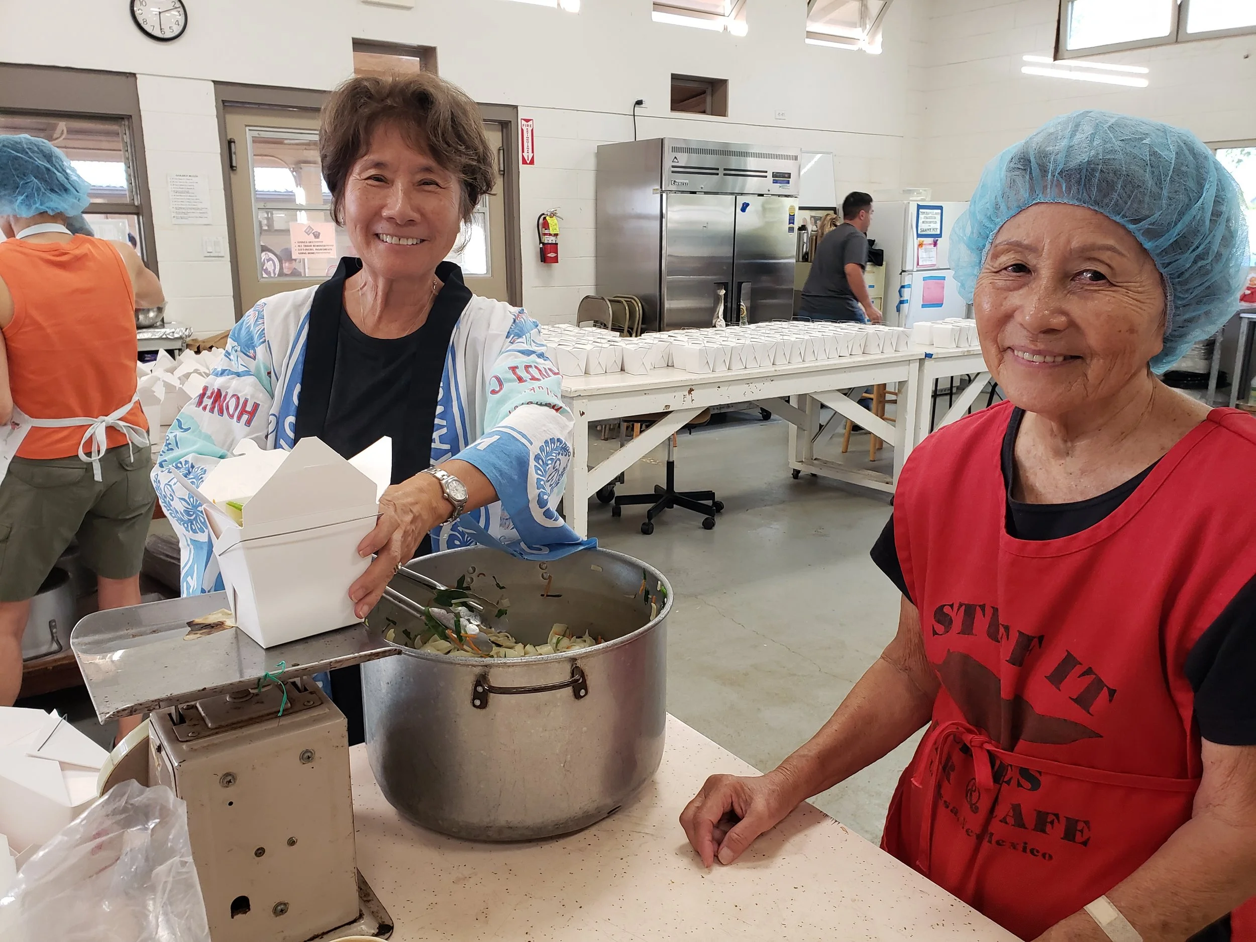 Bobbi and Diane Packing Chow Fun