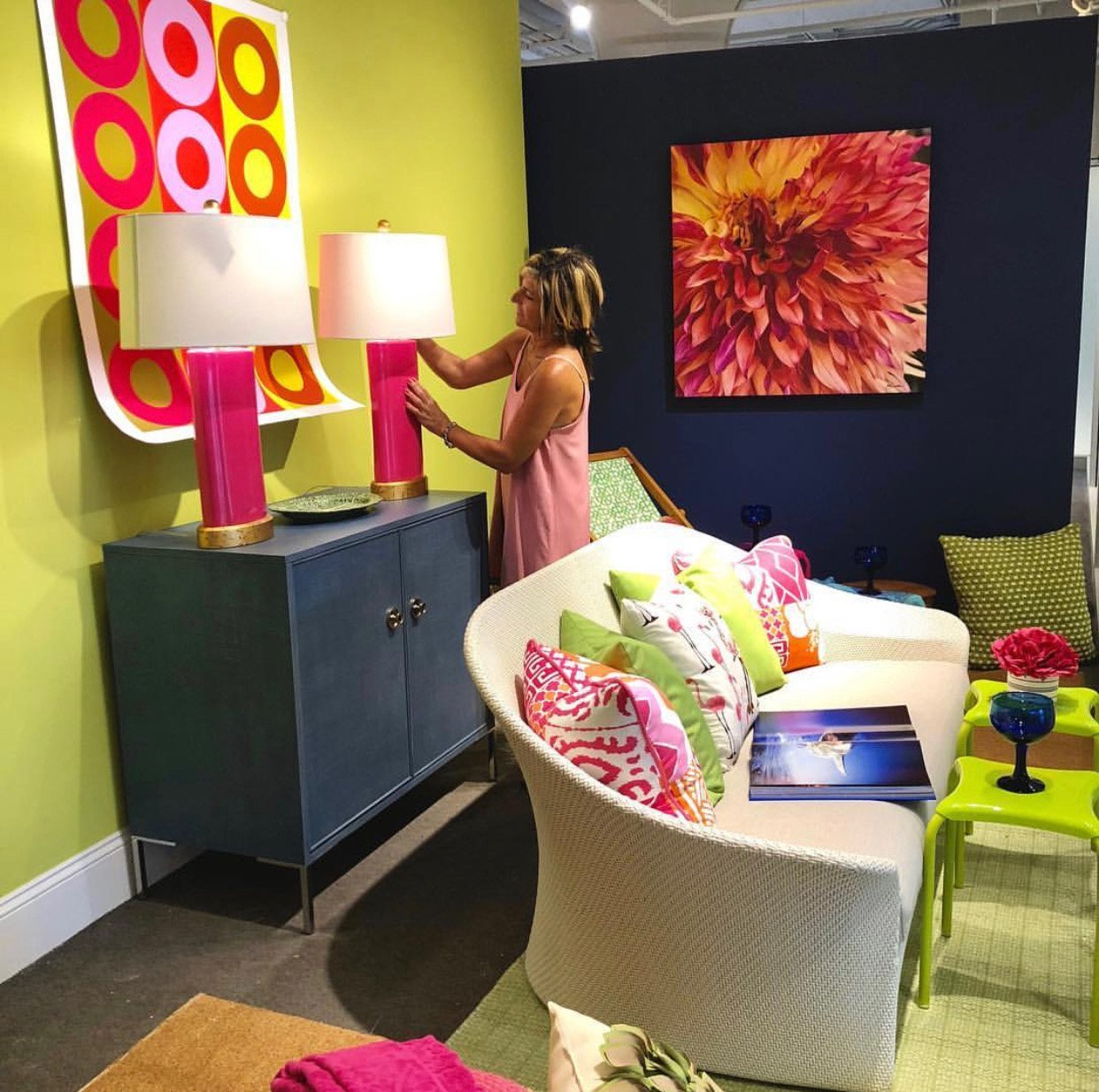 Debbe Daley creating a colorful display window at the Boston Design Center.JPG