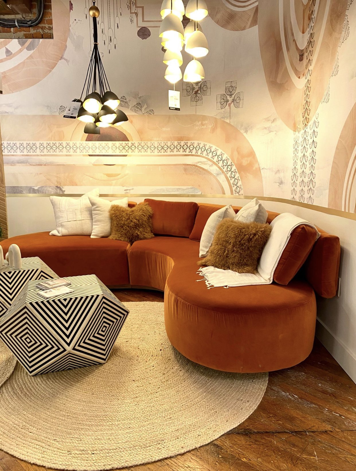 Orange sectional with geometric tables.jpg